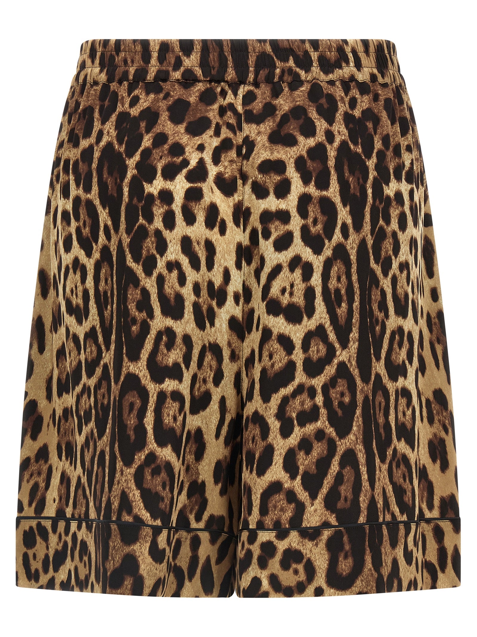 Indulge in the exquisite Dolce & Gabbana Brown Silk Bermuda Shorts, where luxurious silk meets daring leopard print, epitomizing timeless elegance and effortless sophistication.