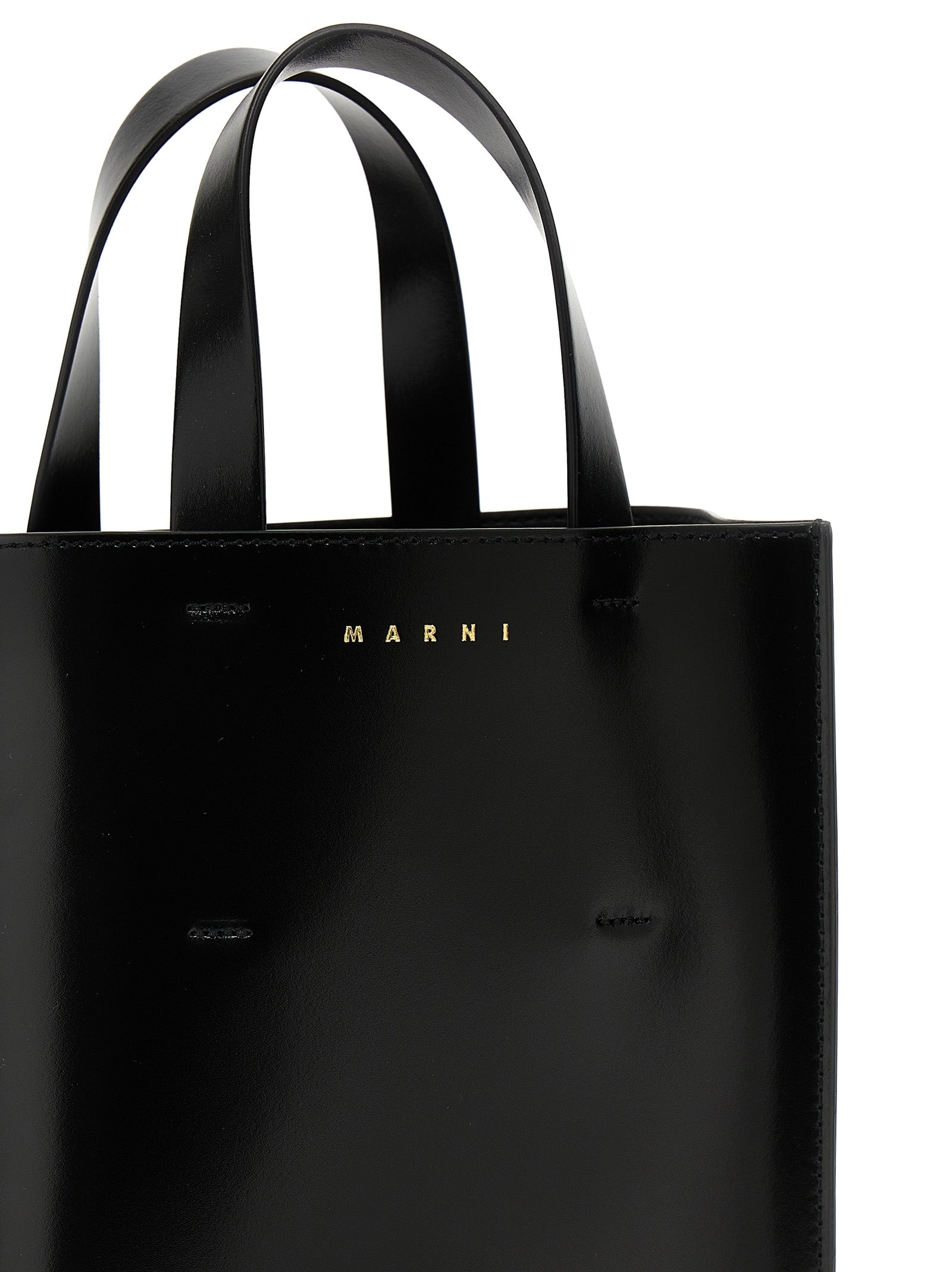 Discover the Marni Black Calfskin Handbag, an exquisite blend of Italian craftsmanship and elegance, perfect for the discerning individual seeking timeless luxury.