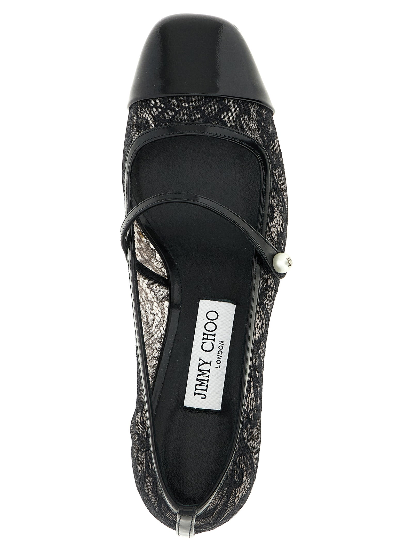 Step into the realm of elegance with Jimmy Choo's Black Tencel Mid Heel Pumps, where exquisite lace and patent leather converge, embodying timeless luxury for every occasion.