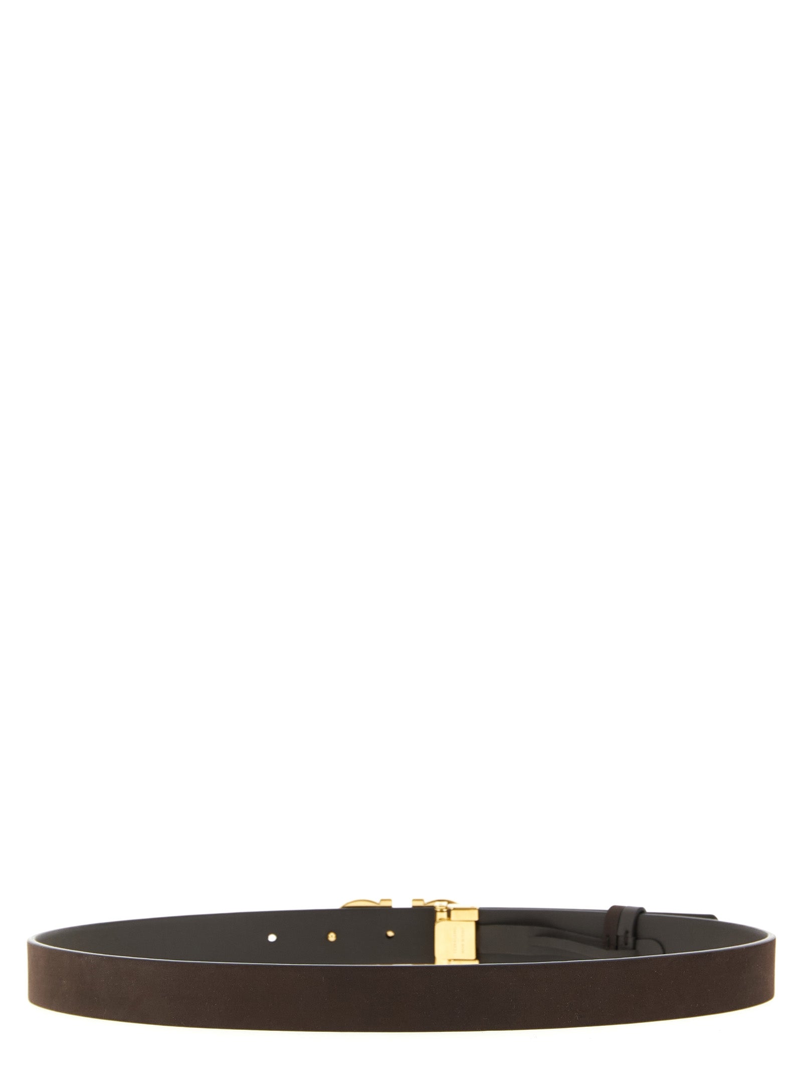 Indulge in the exquisite Ferragamo Brown Calfskin Regular Belt, a masterpiece of Italian craftsmanship that embodies timeless luxury and sophistication for every occasion.