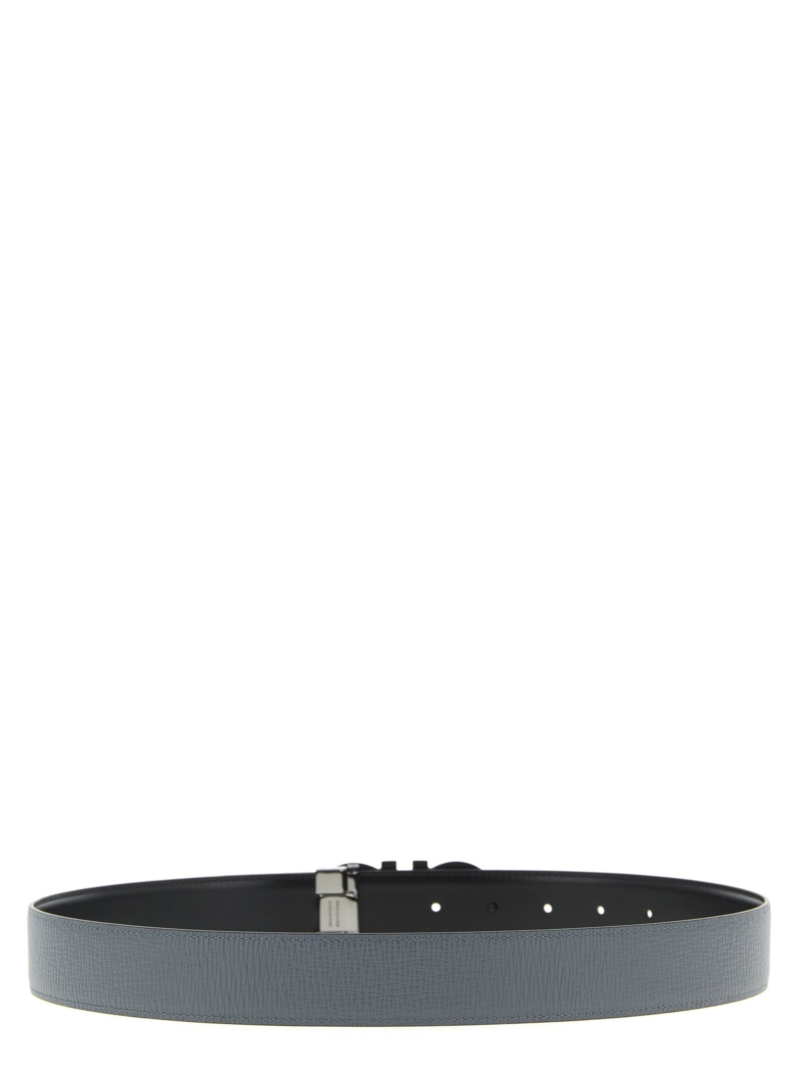 Elevate your style with the Ferragamo Gray Calfskin Regular Belt, a reversible luxury crafted from premium calfskin, embodying timeless elegance and sophistication.