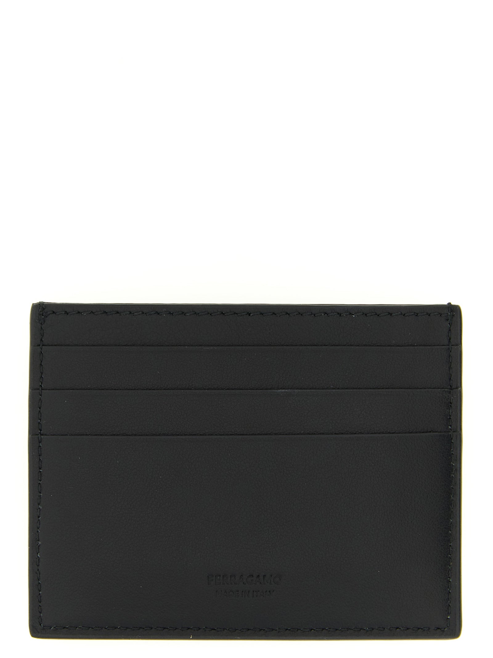 Experience the epitome of sophistication with the Ferragamo Black Calfskin Cardholder, a luxurious accessory crafted in Italy, merging artistry with timeless elegance.
