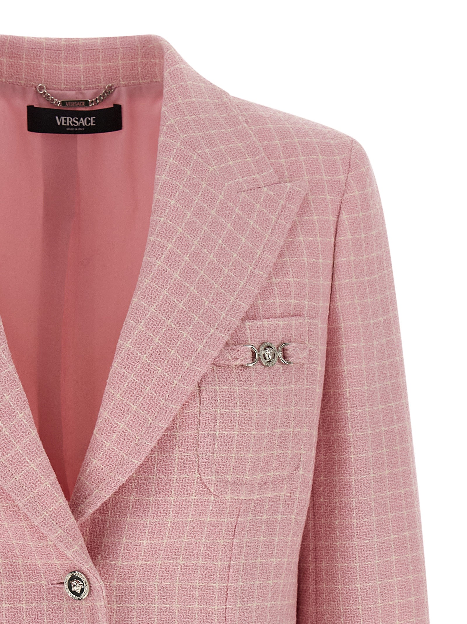 Discover the Versace Multicolor Virgin Wool Blazer, a masterpiece of artisanal craftsmanship that embodies luxury and elegance for the discerning individual.