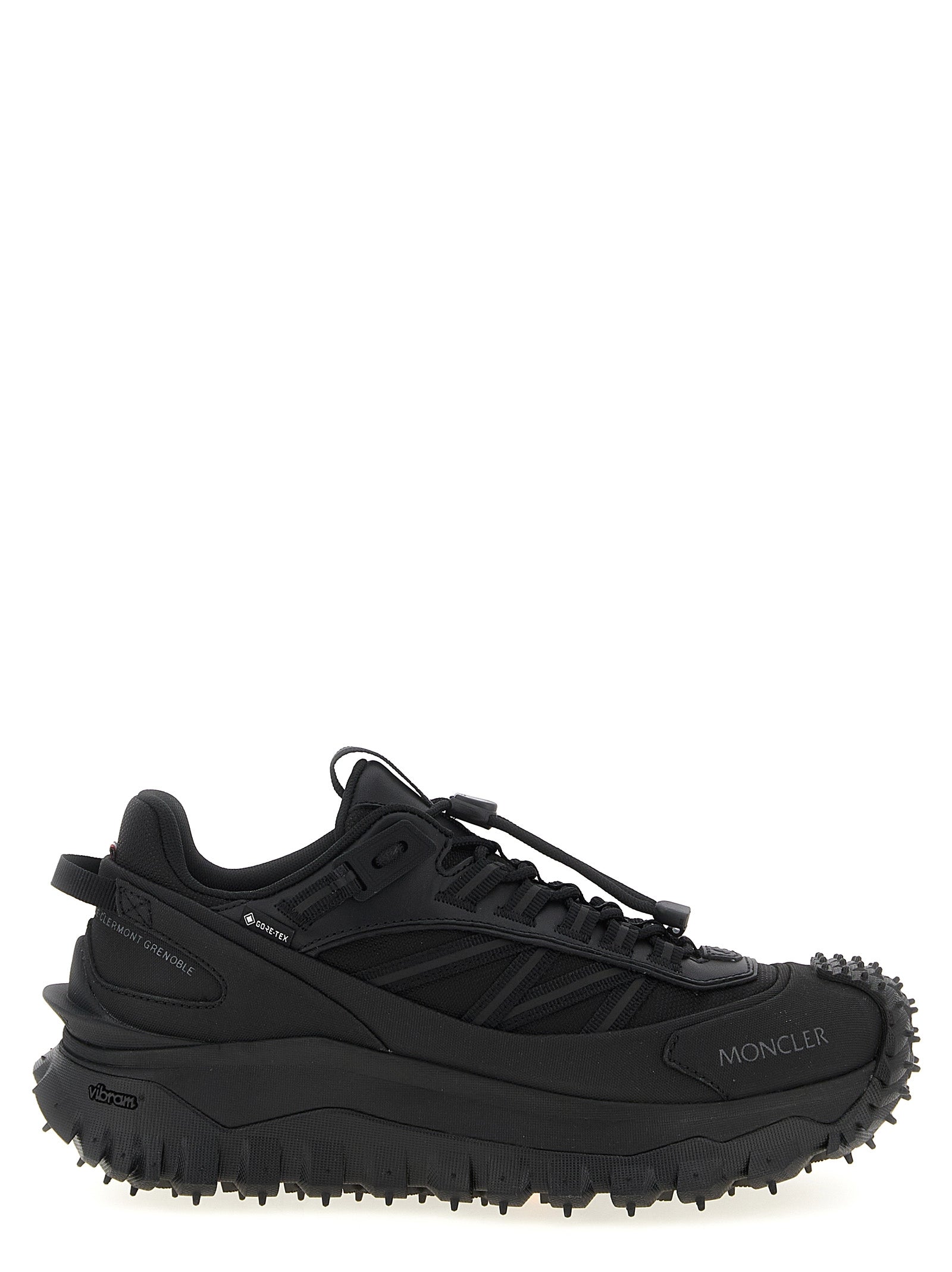 Discover the Moncler Black Polyamide Athletic Sneakers, where luxury meets performance in exquisite craftsmanship, designed for the discerning individual who commands attention.