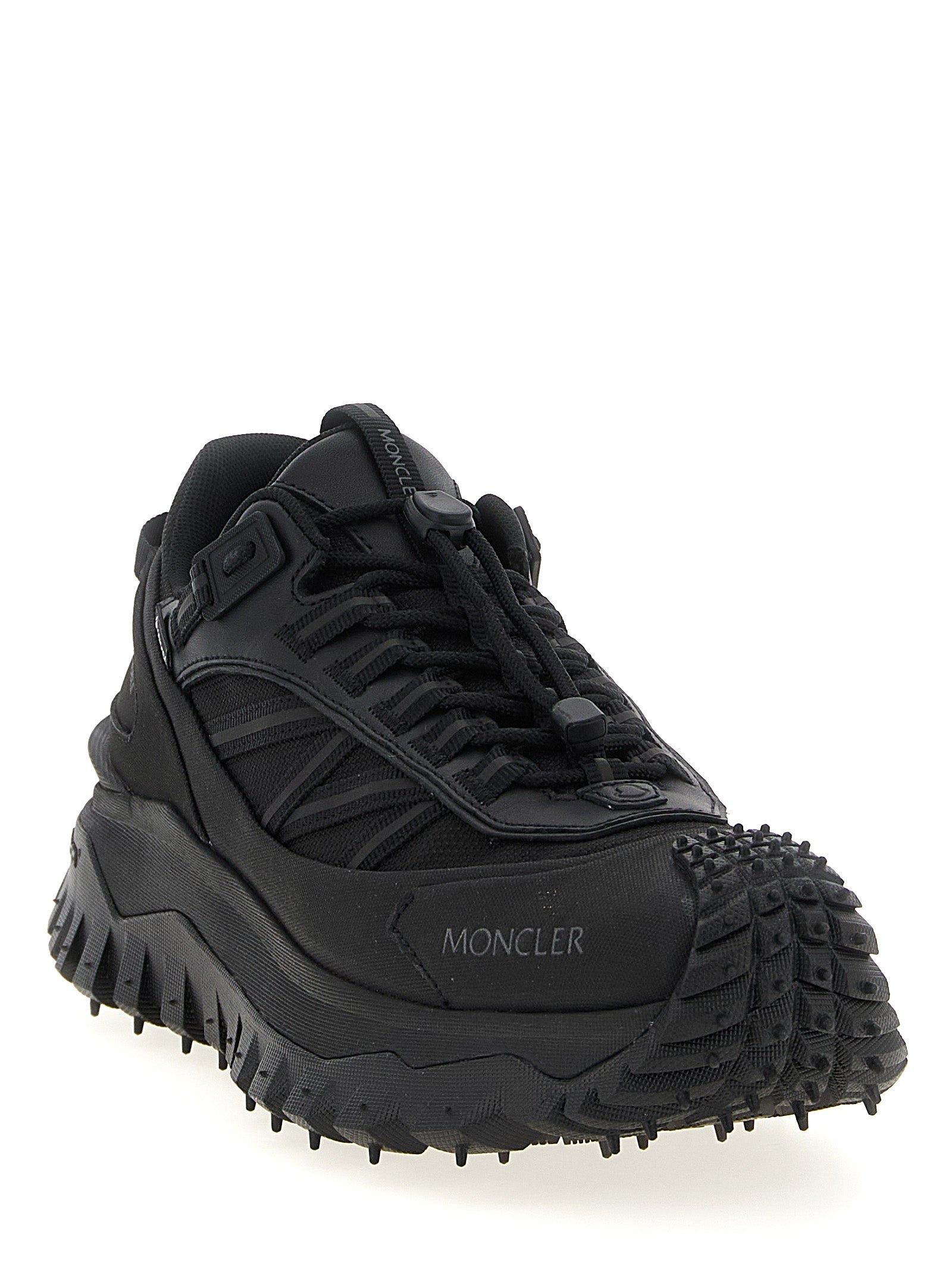 Indulge in the Moncler Black Polyamide Athletic Sneakers, where luxury meets performance. Crafted with premium materials, these sneakers elevate your style for any adventure.