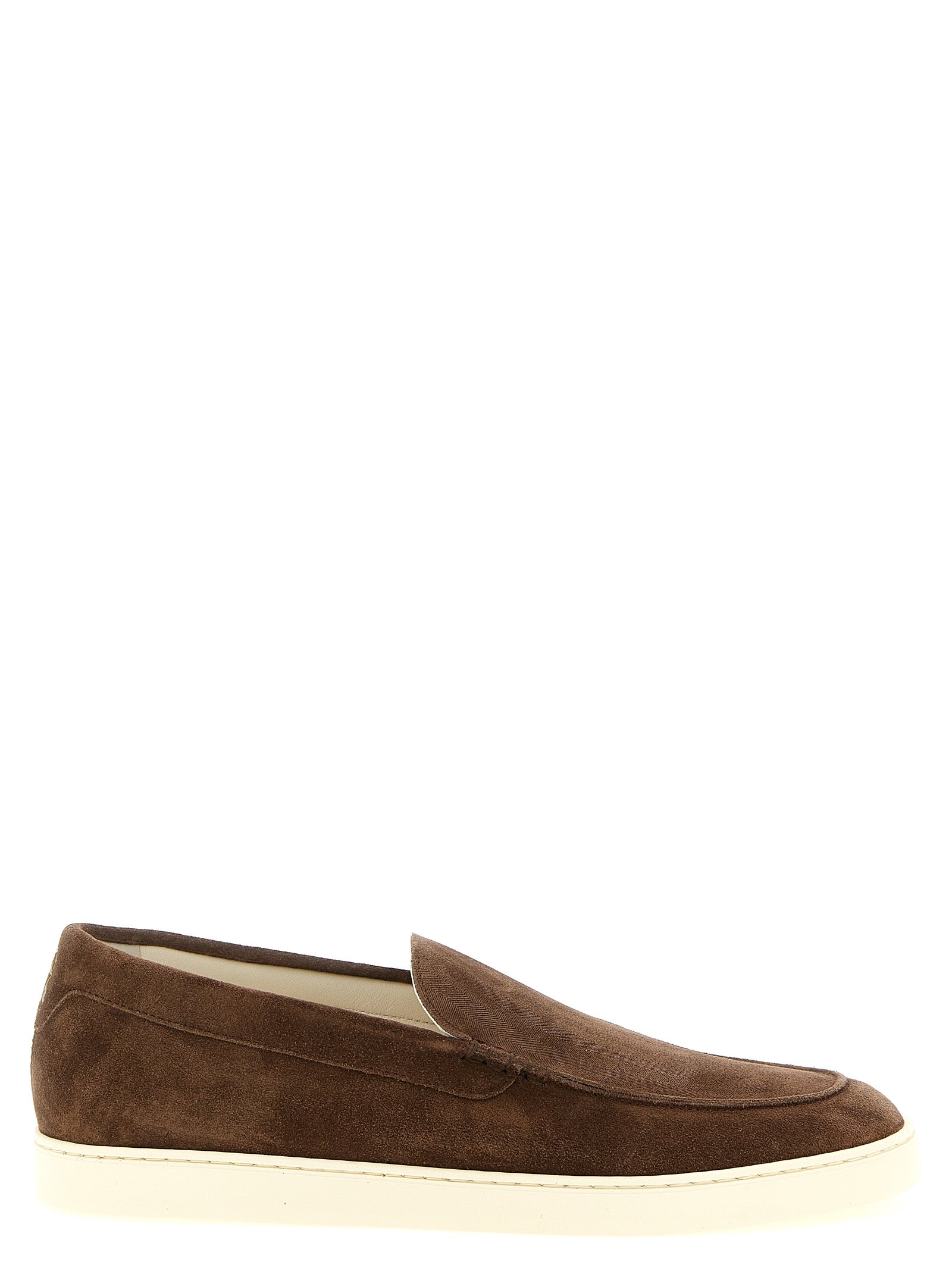 Experience the epitome of elegance with Brunello Cucinelli's Brown Calfskin Slip-On Loafers, crafted from luxurious leather for timeless sophistication and comfort.
