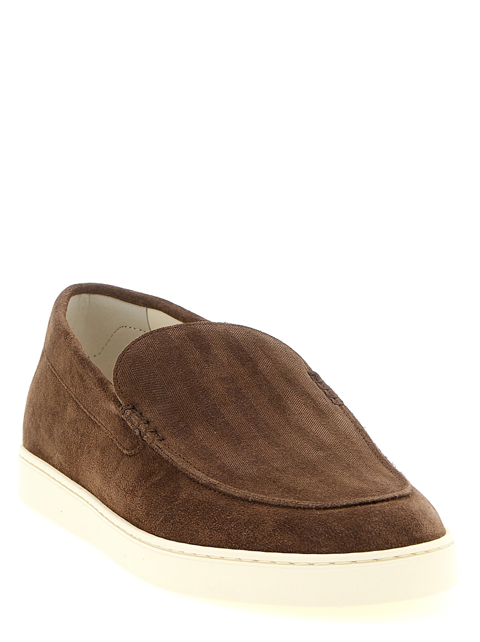 Experience the exquisite Brunello Cucinelli Brown Calfskin Slip-On Loafers, where Italian craftsmanship meets timeless elegance, perfect for the discerning modern gentleman.