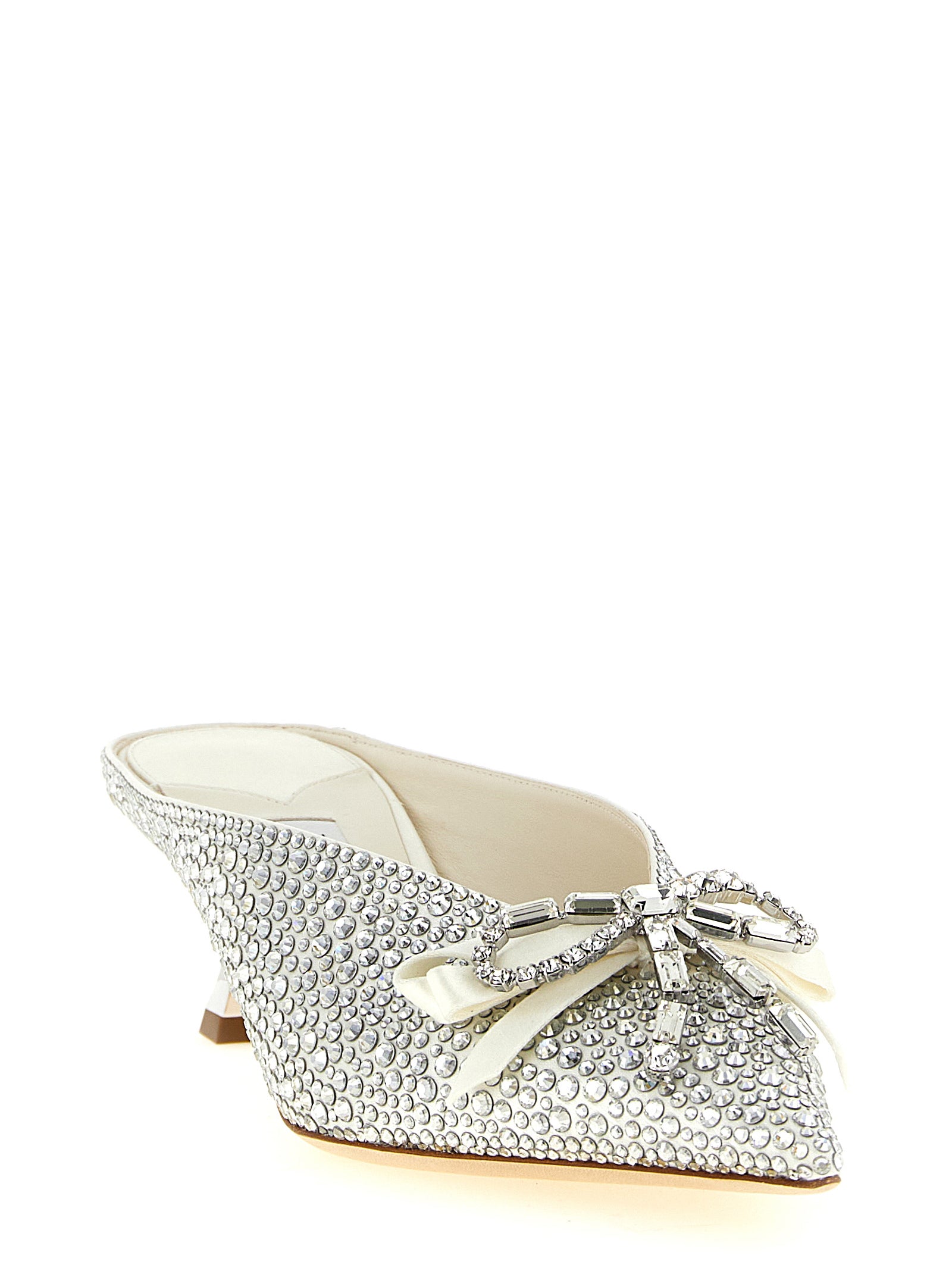 Step into luxury with Jimmy Choo's Silver Tencel Mid Heel Pumps, where exquisite craftsmanship and timeless elegance elevate your every moment.