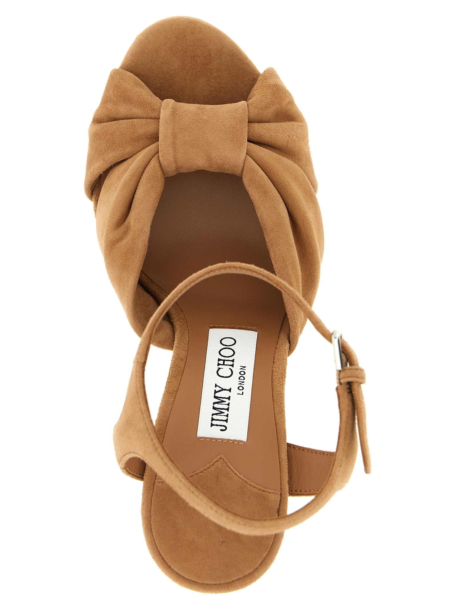 Indulge in the exquisite craftsmanship of Jimmy Choo's Heloise brown leather stiletto heel sandals, where Italian luxury meets timeless elegance for the discerning individual.