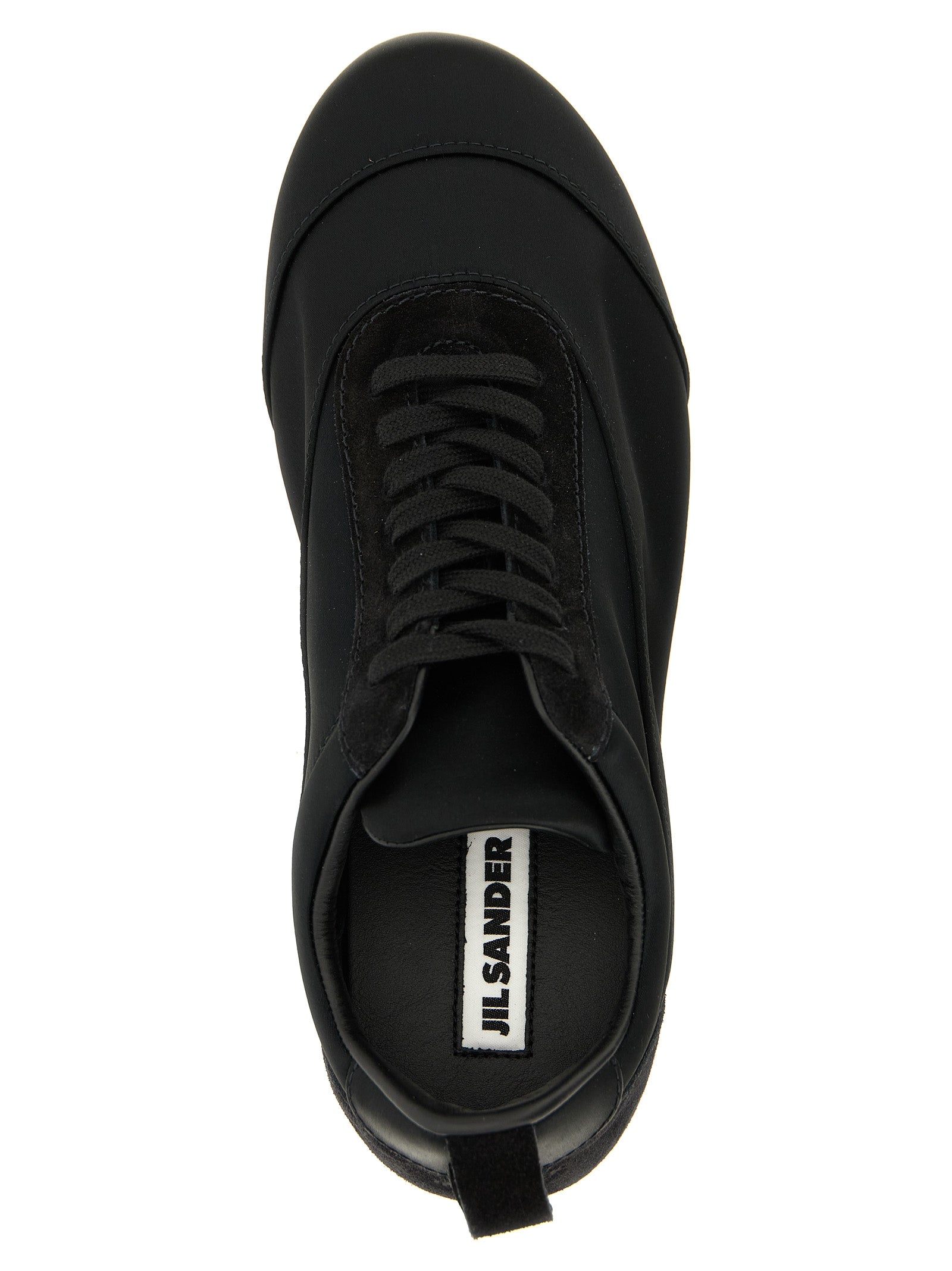 Discover Jil Sander's Black Cotton Low Top Sneakers, a luxurious blend of artisanal craftsmanship and contemporary design, perfect for the discerning fashion connoisseur.