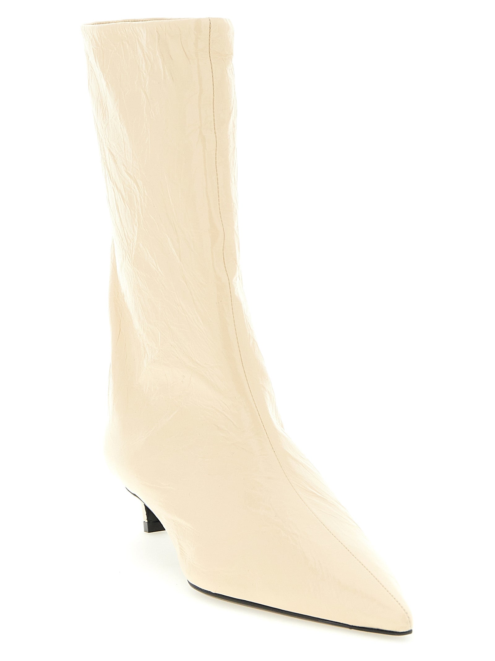 Elevate your style with Jil Sander's Beige Calfskin Ankle Boots, a testament to artisanal craftsmanship and modern elegance, perfect for the discerning individual.
