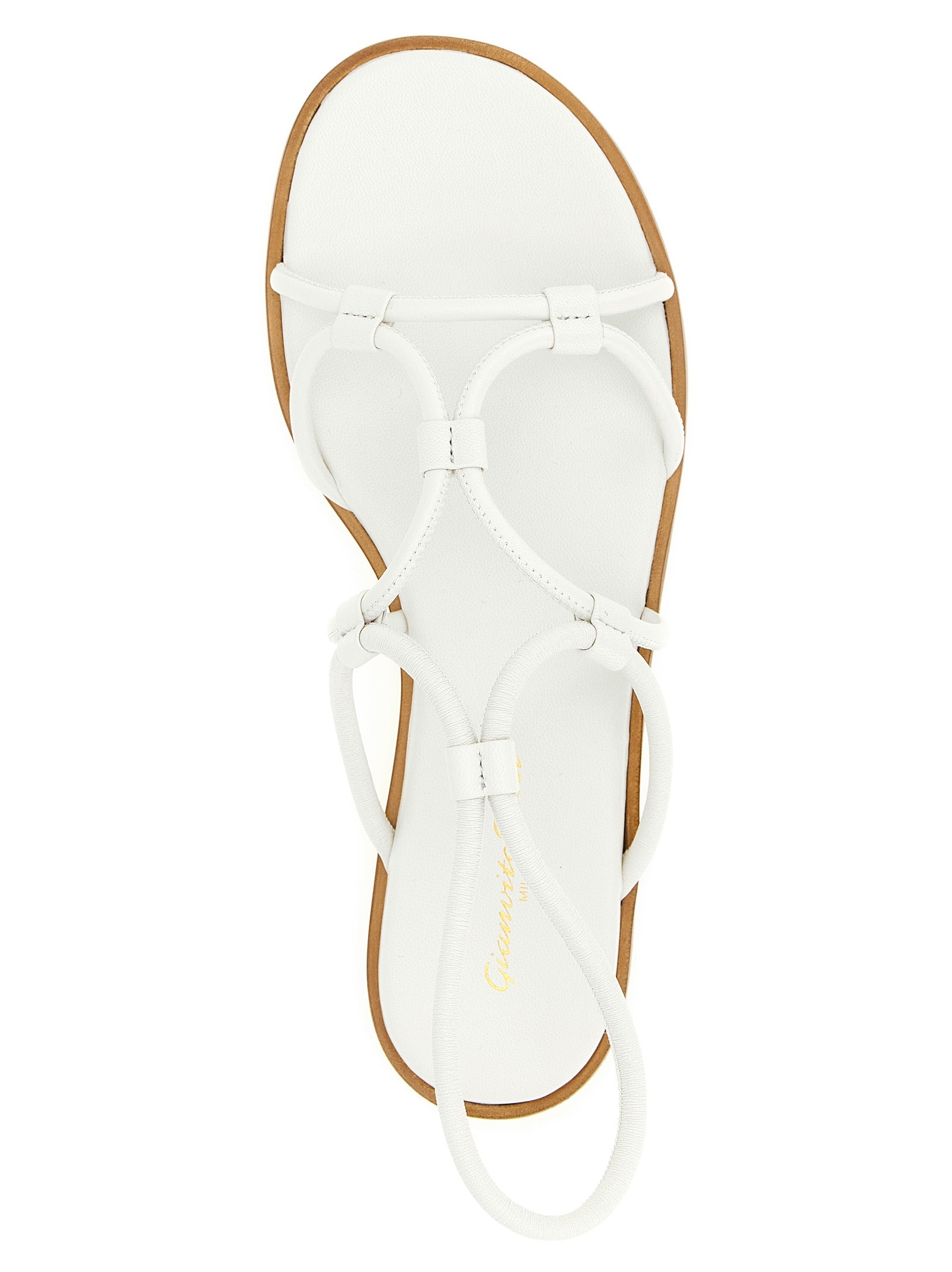 Experience the exquisite elegance of Gianvito Rossi's White Lamb Leather Flat Sandals, where artisanal craftsmanship meets timeless luxury for the discerning individual.