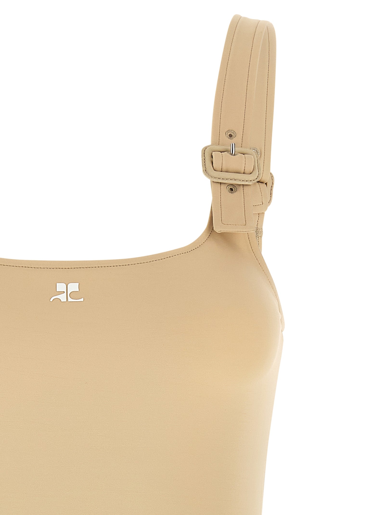 Discover the Courrèges Beige Polyamide Bodysuit, a luxurious blend of retro chic and modern allure, crafted in Italy for the discerning fashionista.