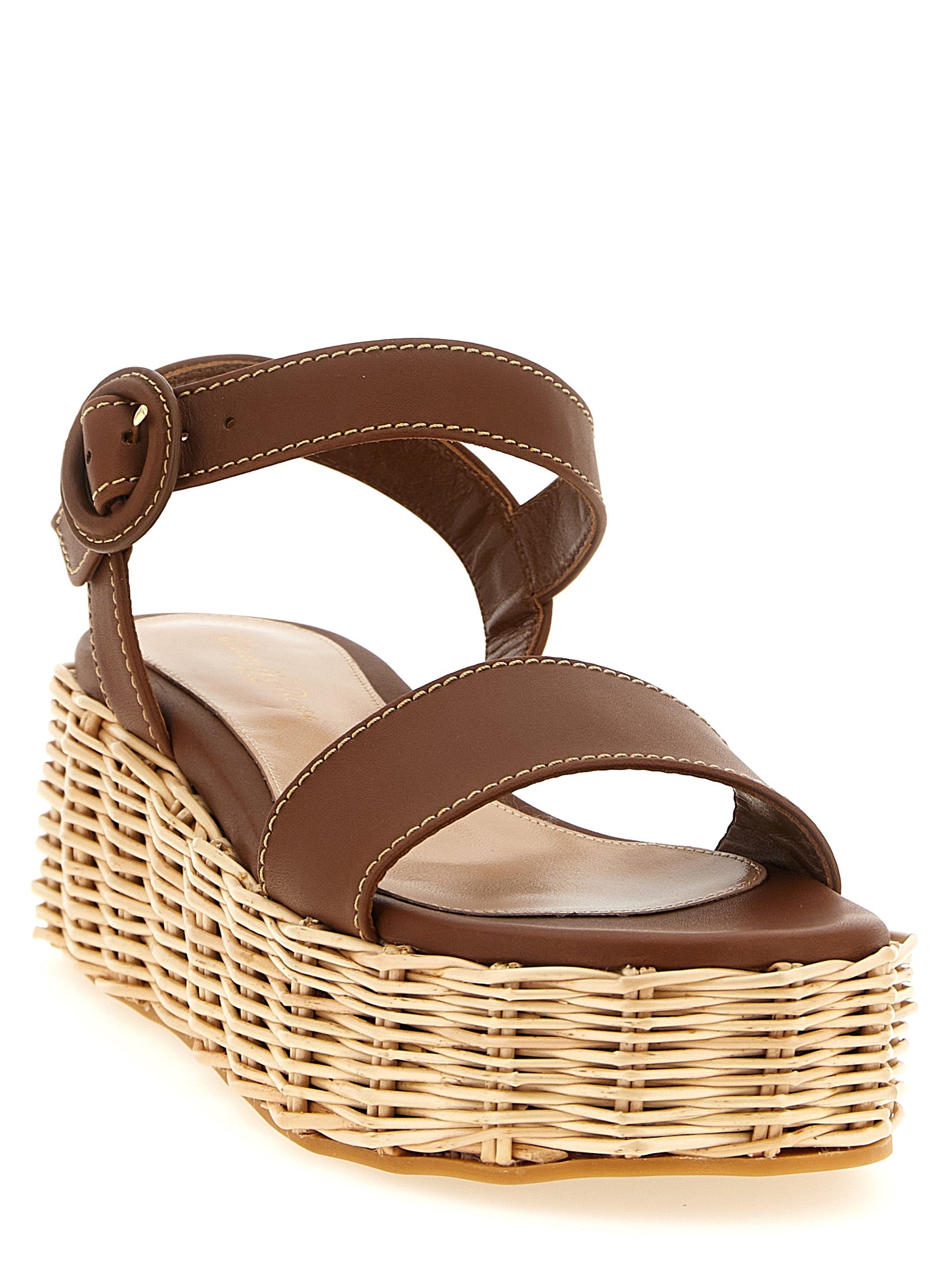 Indulge in Gianvito Rossi's Brown Calfskin Wedge Sandals, where exquisite Italian craftsmanship meets effortless elegance, perfect for the discerning connoisseur.