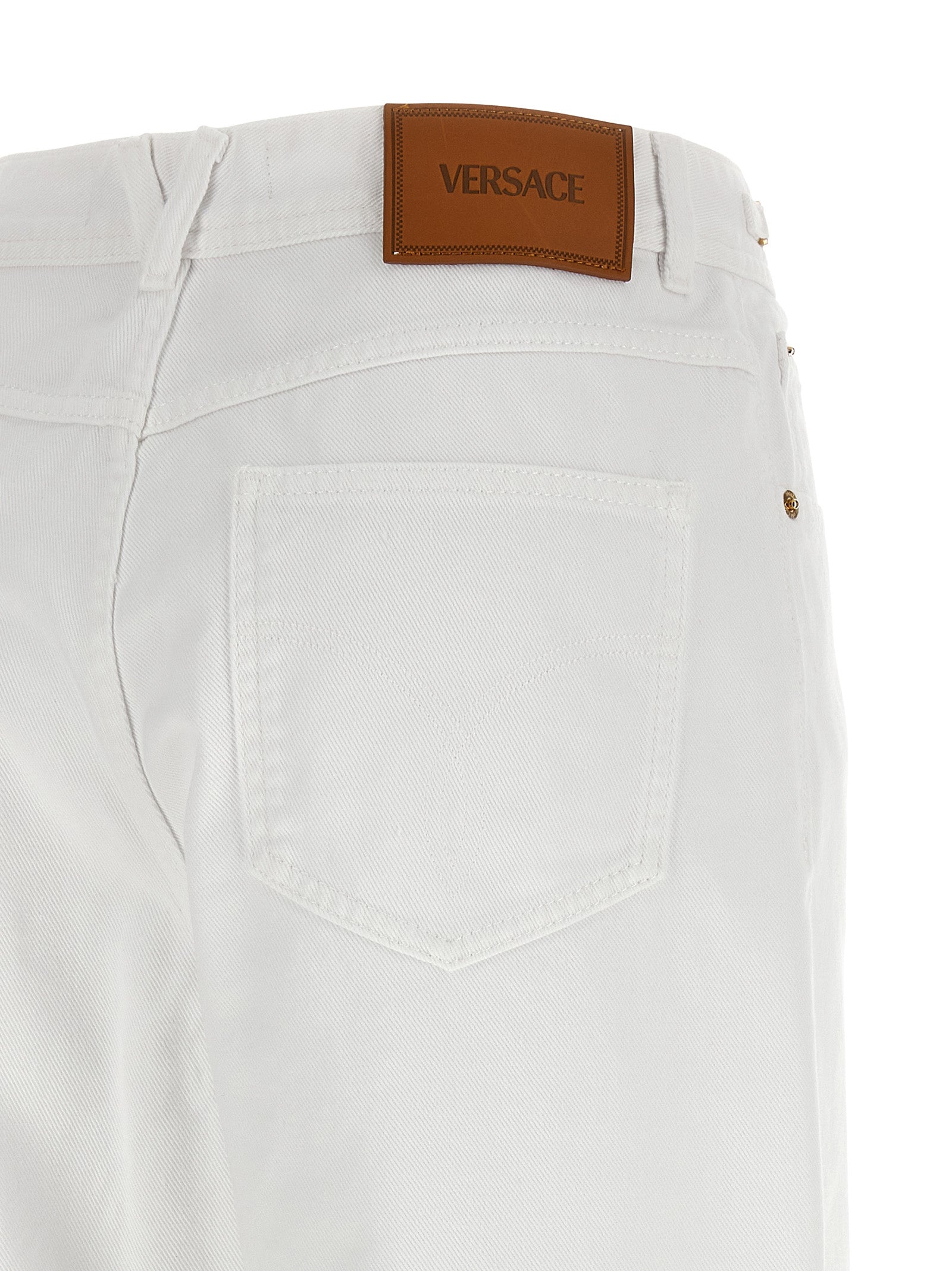 Elevate your style with Versace White Cotton Straight-Leg Jeans, a masterpiece of luxurious craftsmanship and timeless elegance, perfect for any sophisticated occasion.