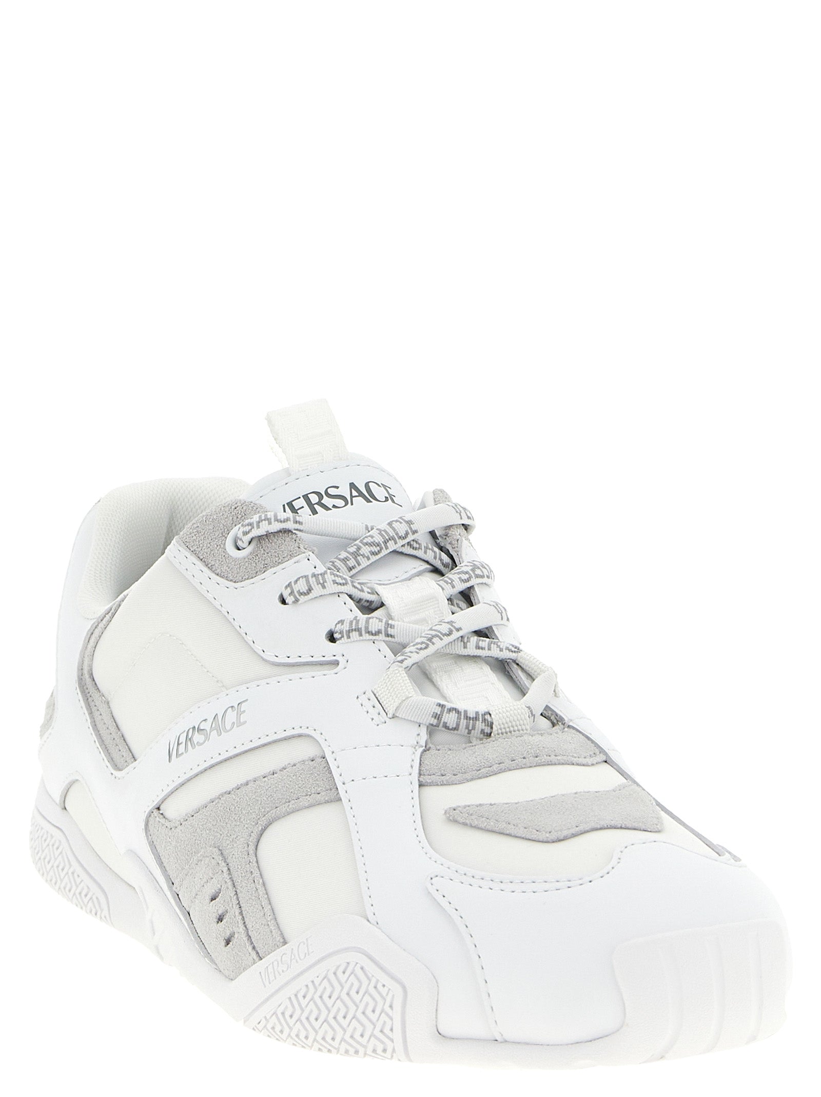 Elevate your style with Versace White Calfskin Athletic Sneakers, crafted from luxurious calfskin leather, merging opulence with contemporary flair for the discerning individual.