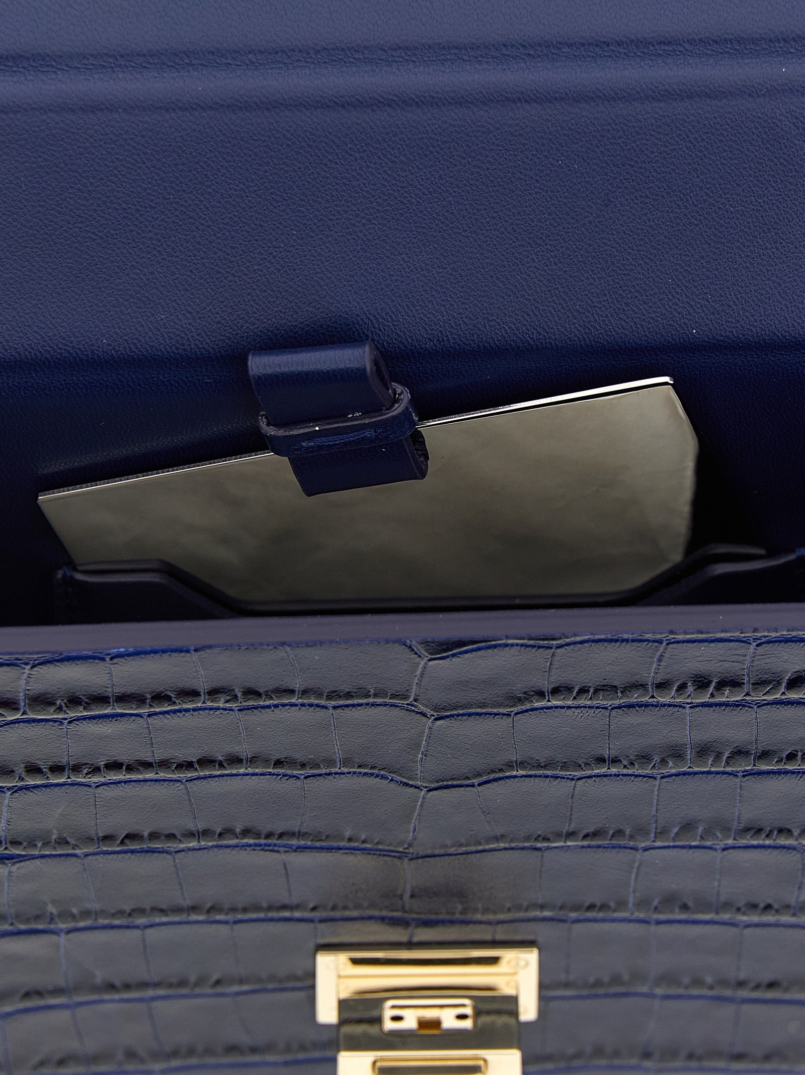 Discover the Tom Ford Blue Calfskin Clutch Bag, a luxurious blend of exquisite craftsmanship and timeless elegance, perfect for elevating any ensemble.