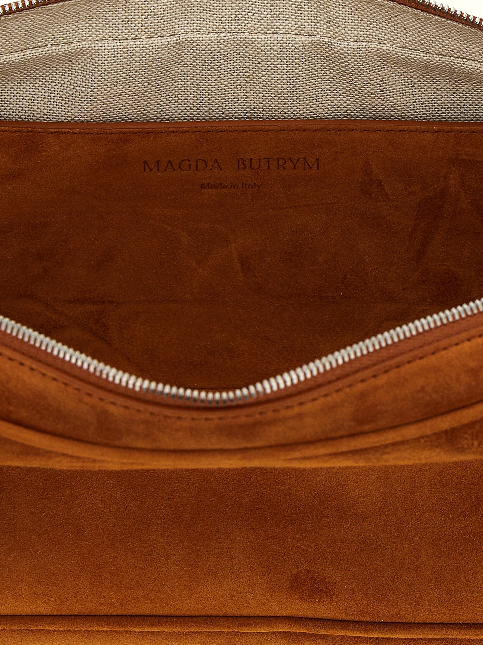 Elevate your style with the Magda Butrym Brown Calfskin Shoulder Bag, a masterpiece of Italian craftsmanship that embodies luxury and sophistication for the discerning individual.