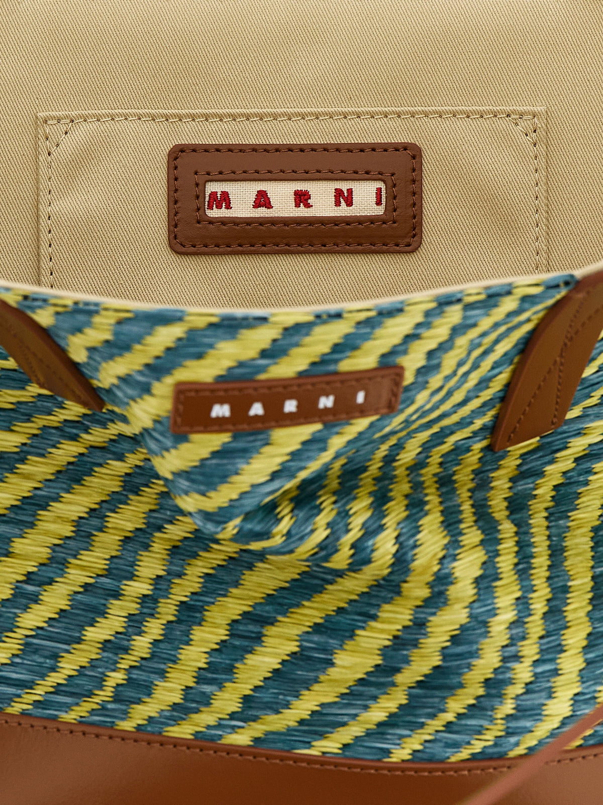 Elevate your style with the Marni Bicolor Polyamide Tote Bag, a luxurious blend of Italian craftsmanship and sustainable elegance, perfect for any discerning individual.