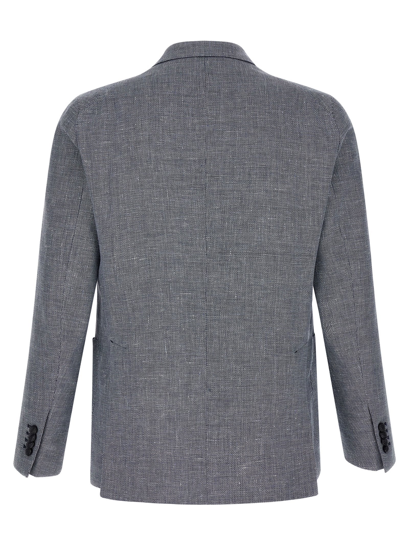 Elevate your wardrobe with the Tagliatore Blue Linen Blazer, a luxurious blend of linen and cotton, embodying Italian craftsmanship and timeless sophistication for discerning tastes.