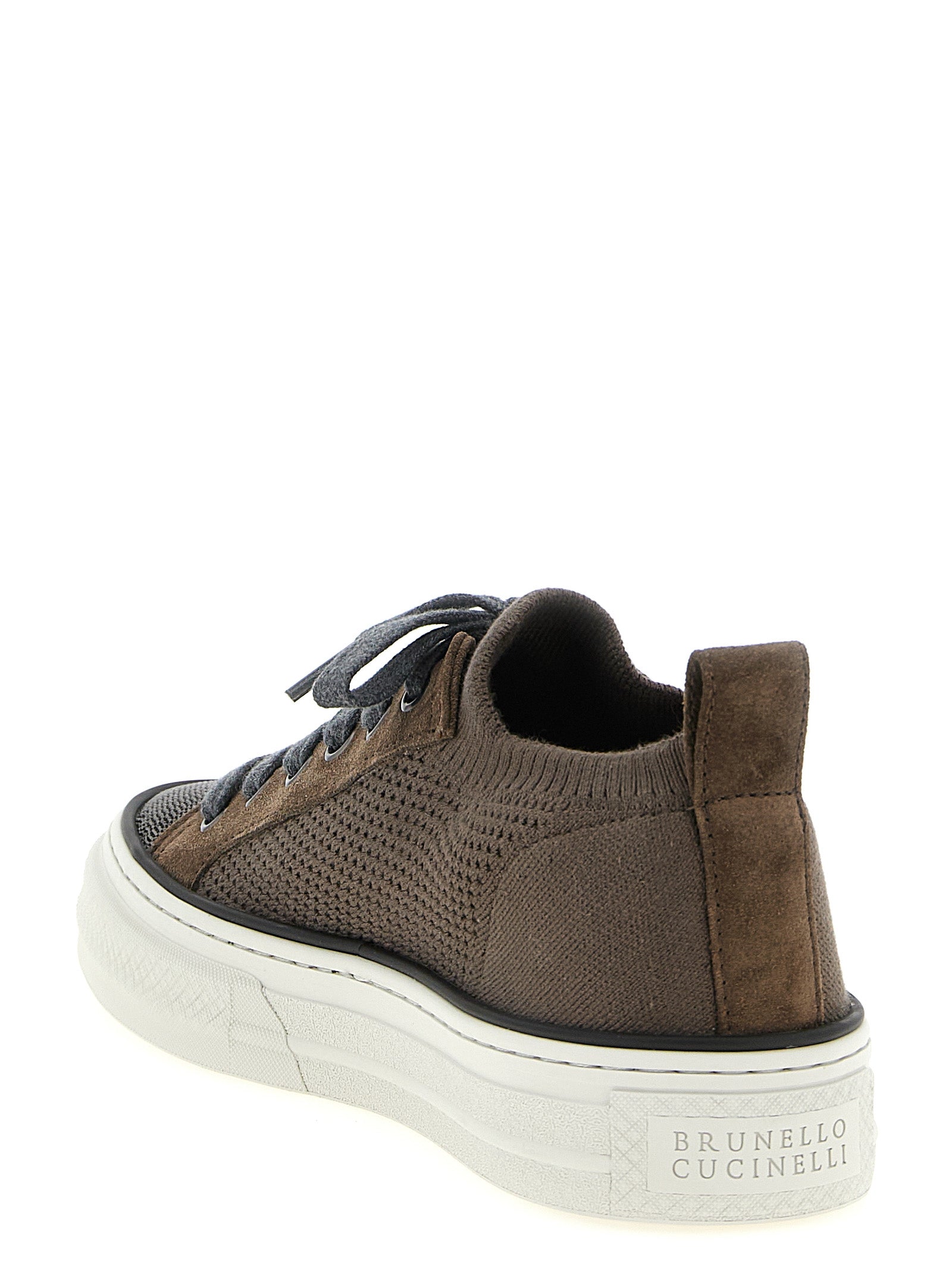 Step into the realm of luxury with Brunello Cucinelli's Brown Cotton Low Top Sneakers, where artisanal craftsmanship meets sophisticated elegance for the discerning individual.