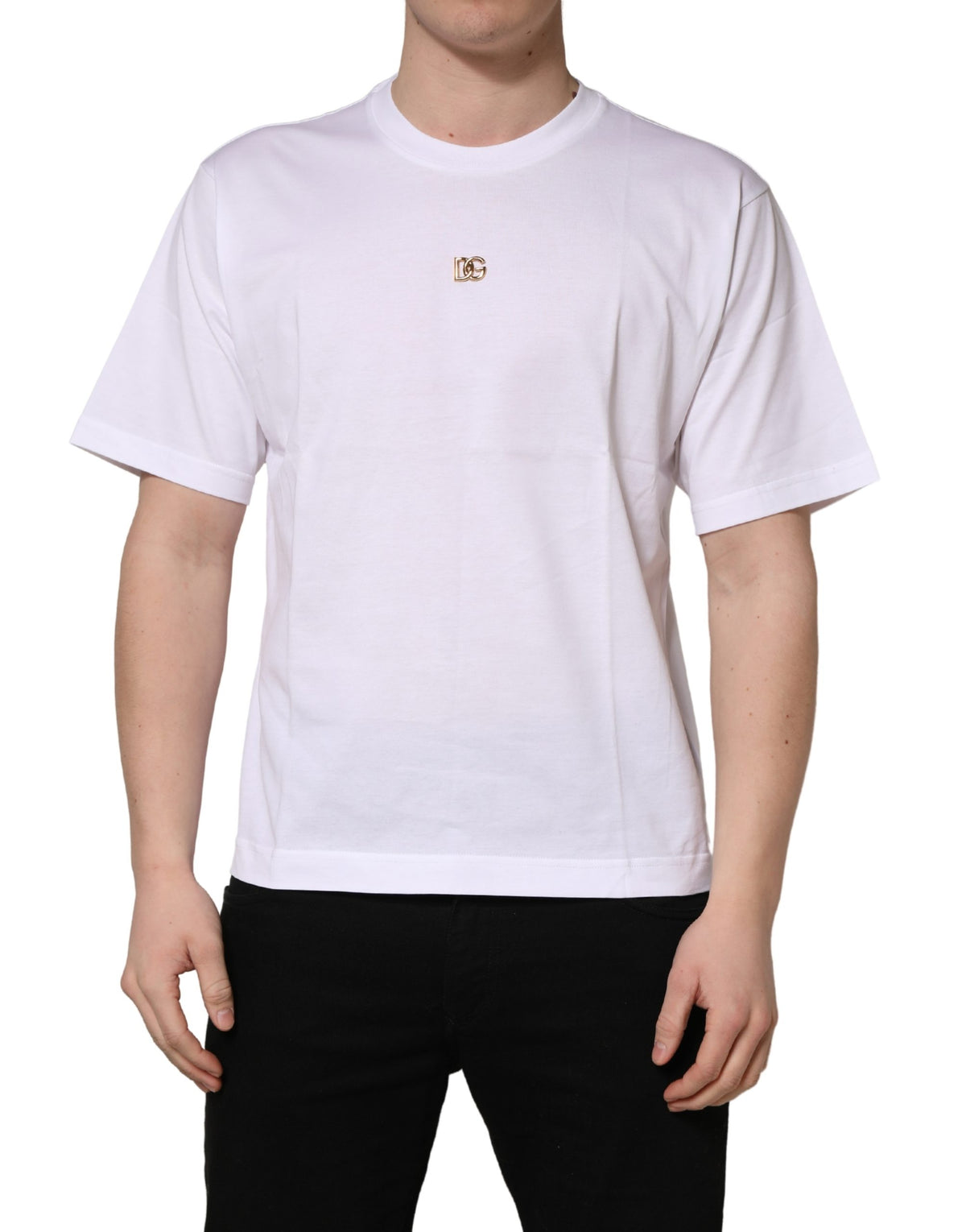 Experience the exquisite allure of Dolce & Gabbana's White Metal DG Logo Cotton T-shirt, a masterpiece of Italian craftsmanship that redefines luxury for the discerning individual.