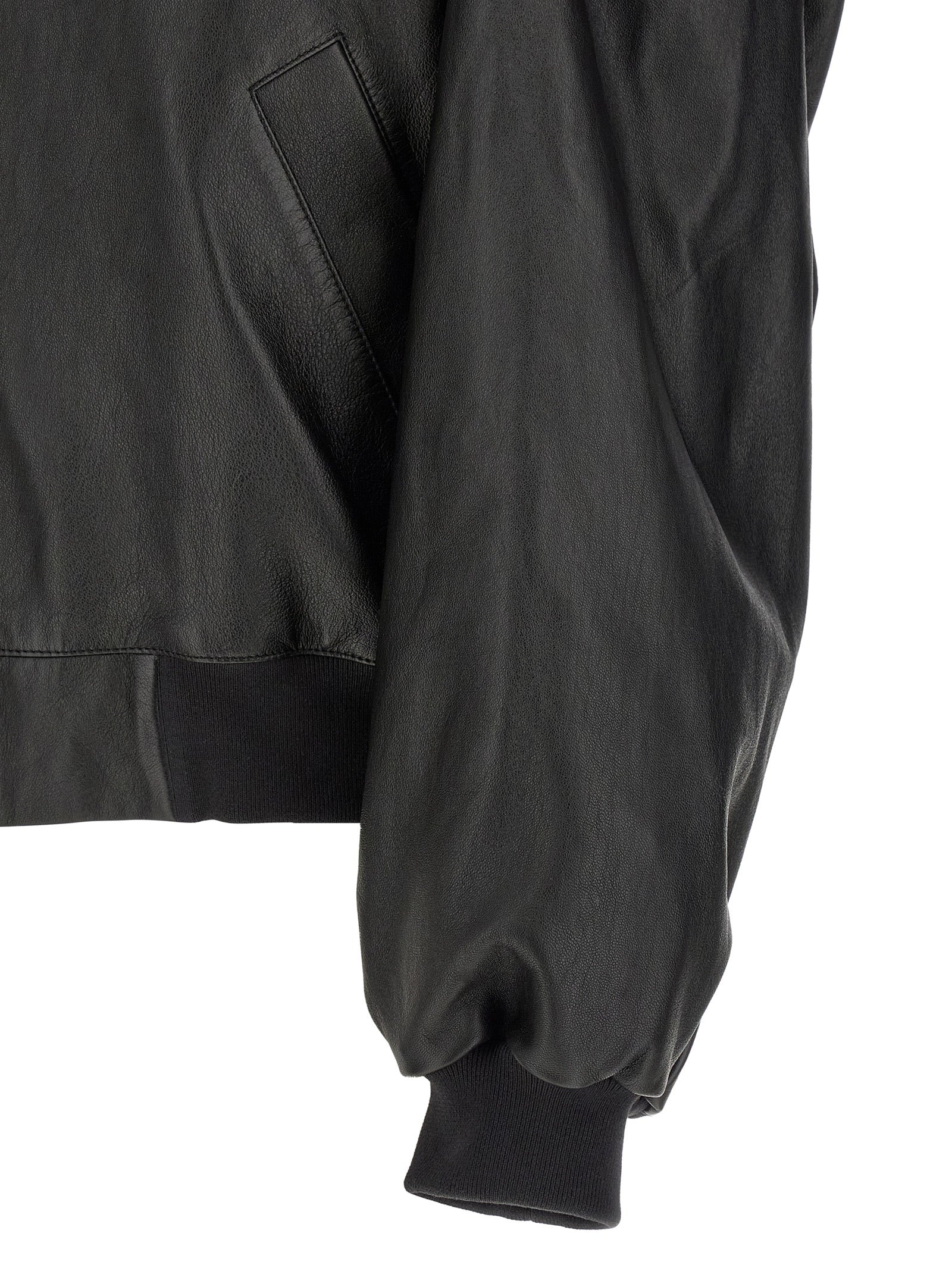 Indulge in the Balenciaga Black Lamb Leather Bomber Jacket, a masterpiece of exquisite craftsmanship and timeless luxury, perfect for those who command elegance and sophistication.
