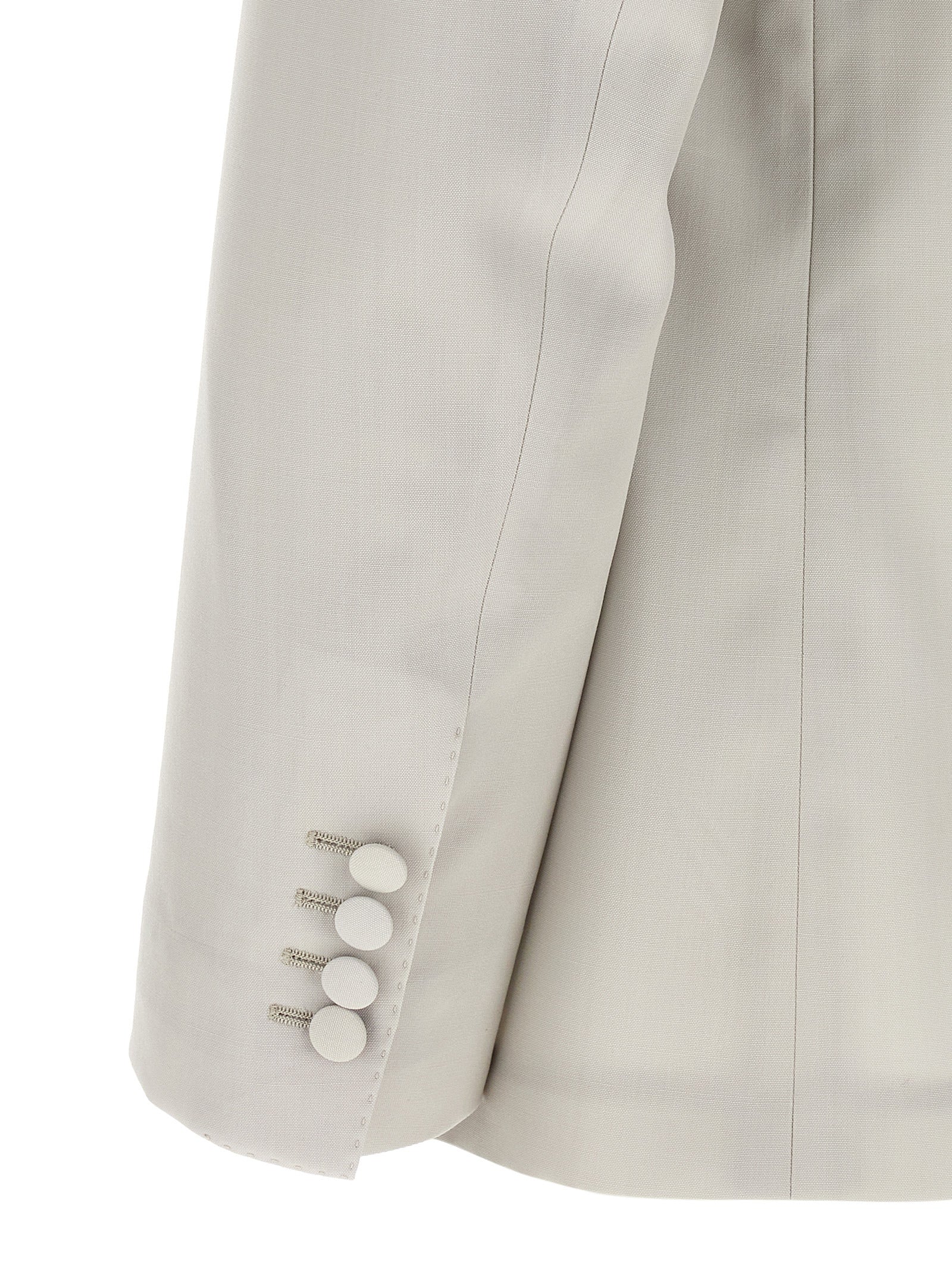 Experience the allure of the Dolce & Gabbana Gray Virgin Wool Blazer, a masterpiece of Italian craftsmanship that redefines sophistication for the modern connoisseur.