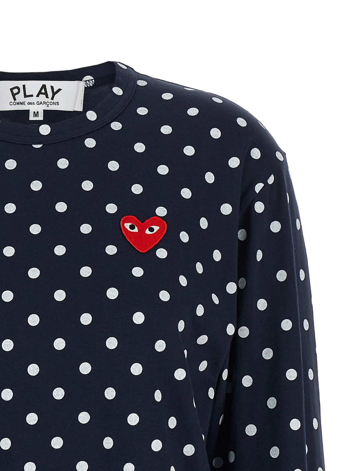 Indulge in the elegance of Comme Des Garçons Play Blue Cotton Long Sleeve T-Shirt, where playful polka dots meet luxurious craftsmanship, redefining sophisticated style.