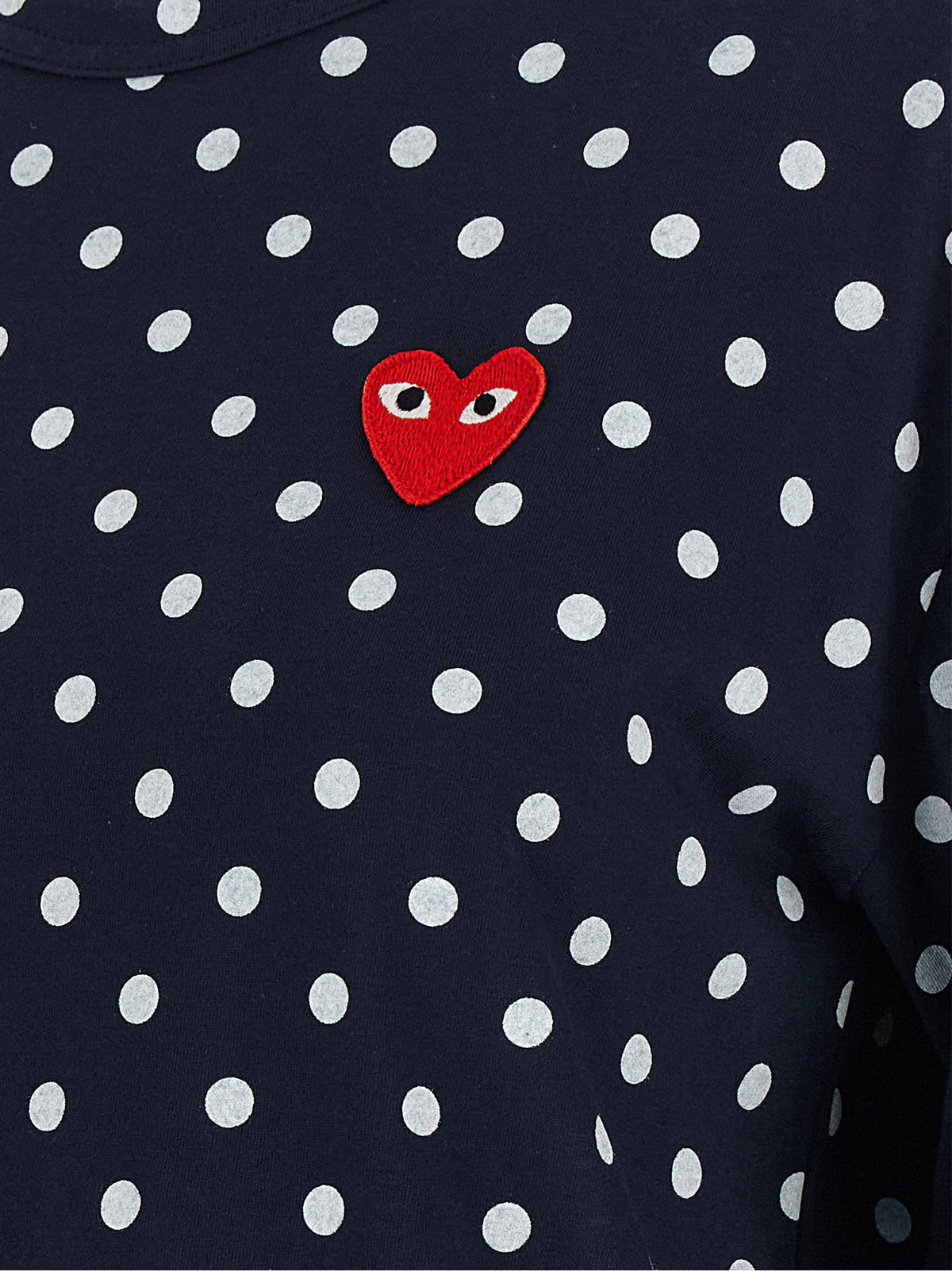 Discover the allure of the Comme Des Garçons Play Blue Cotton Long Sleeve T-Shirt, where exquisite craftsmanship meets playful elegance, perfect for the discerning individual.