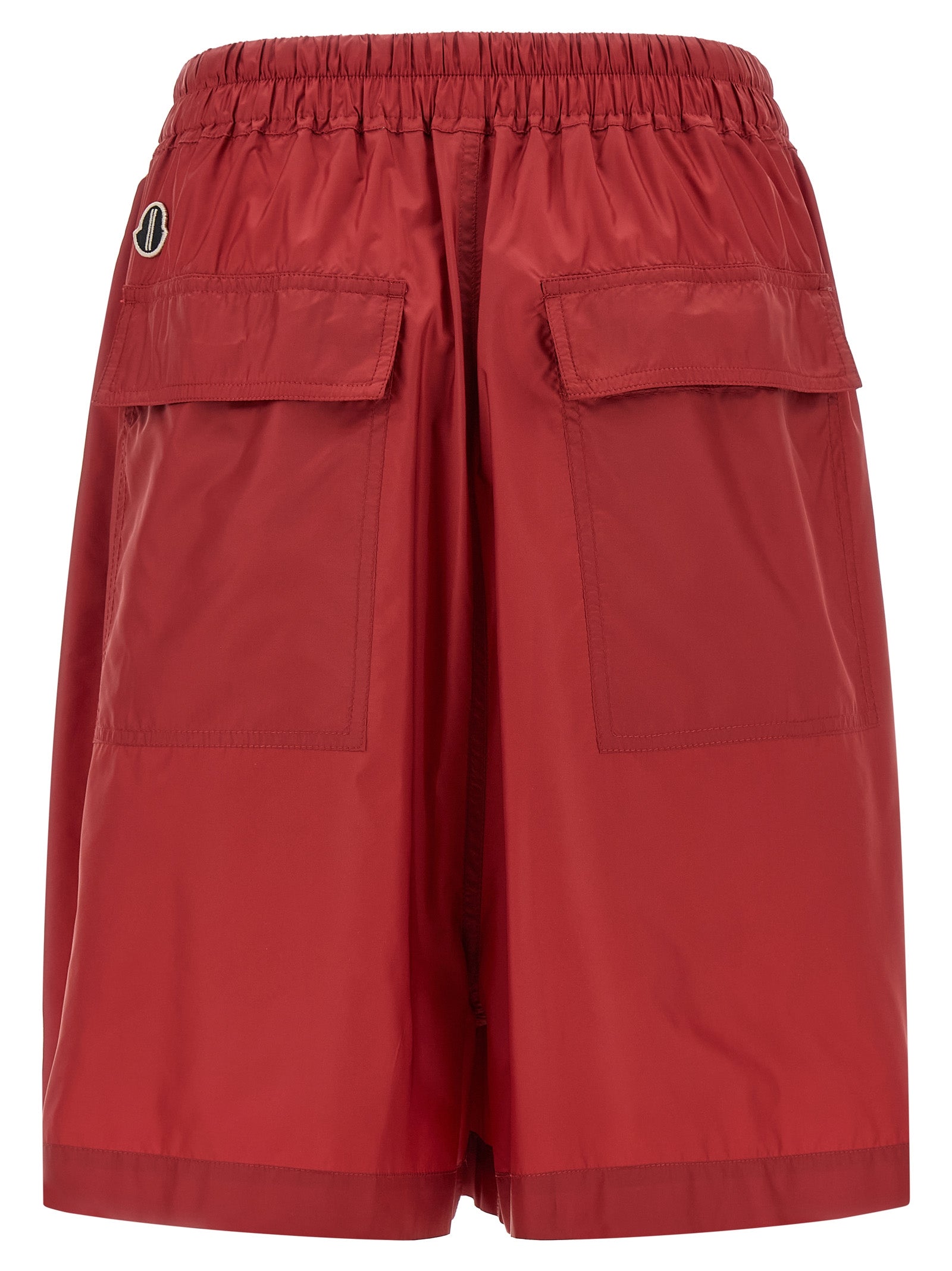 Discover the Rick Owens Multicolor Polyester Bermuda Shorts, a masterpiece of avant-garde luxury crafted from 100% technical polyester, perfect for the discerning fashionista.