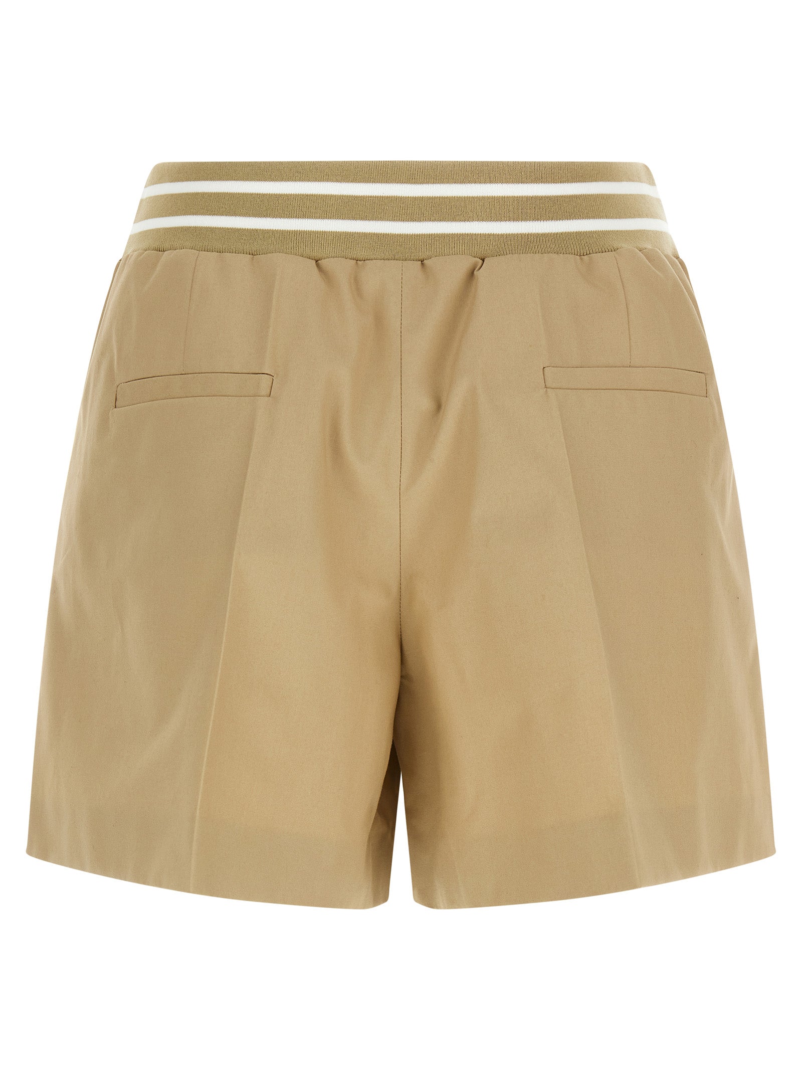 Elevate your summer wardrobe with Moschino Beige Cotton Bermuda Shorts, crafted from luxurious cotton for a sophisticated, wide-leg silhouette that embodies modern elegance.