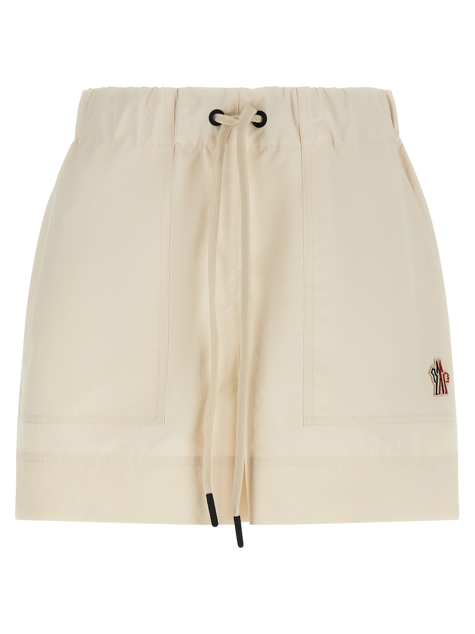 Elevate your summer wardrobe with Moncler Grenoble's exquisite Bermuda Shorts, crafted from luxurious 100% polyester for effortless elegance and comfort.