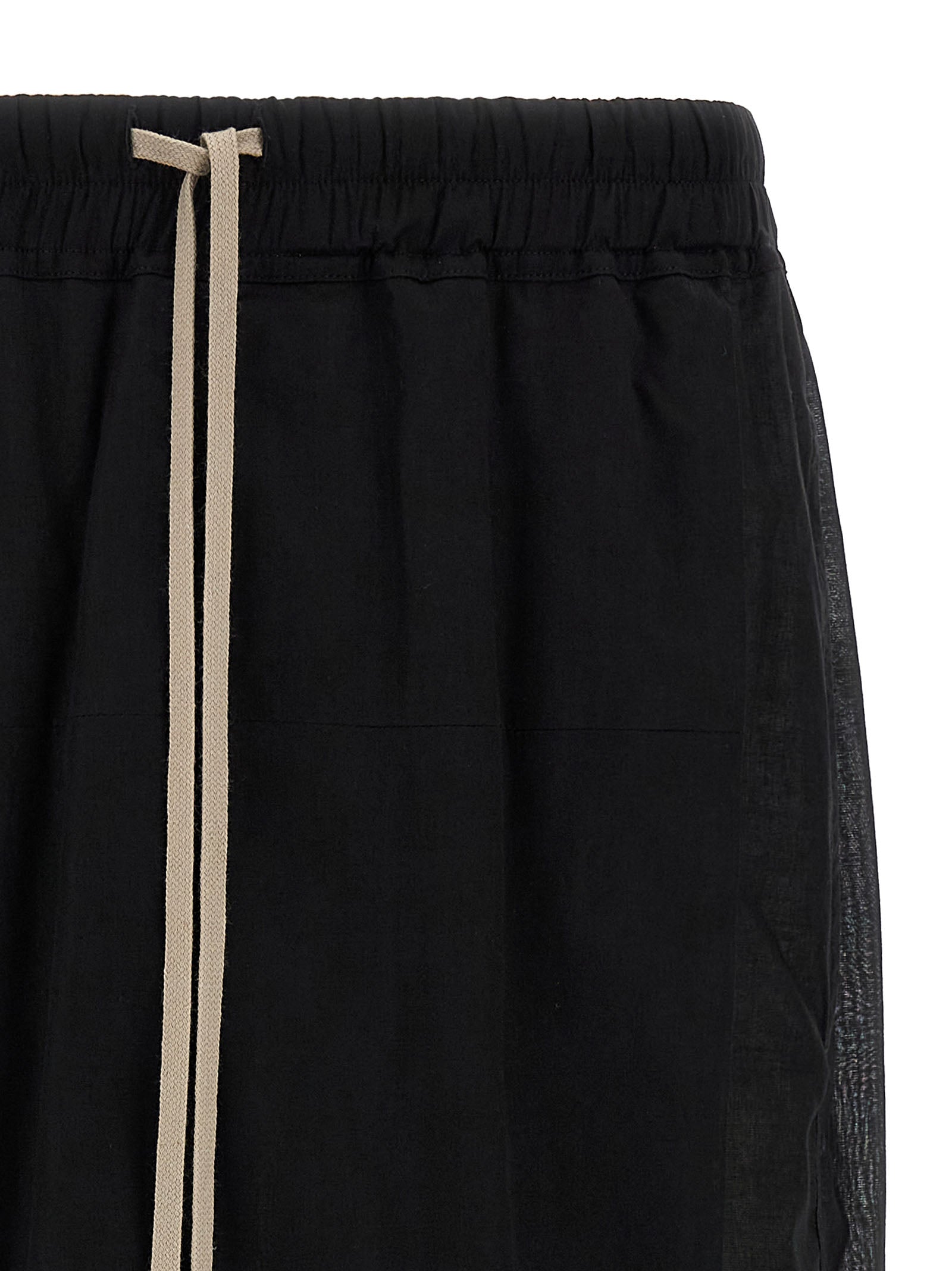 Discover the avant-garde allure of Rick Owens Black Cotton Bermuda Shorts, crafted in Italy from luxurious cotton, merging bold design with effortless sophistication for the modern connoisseur.