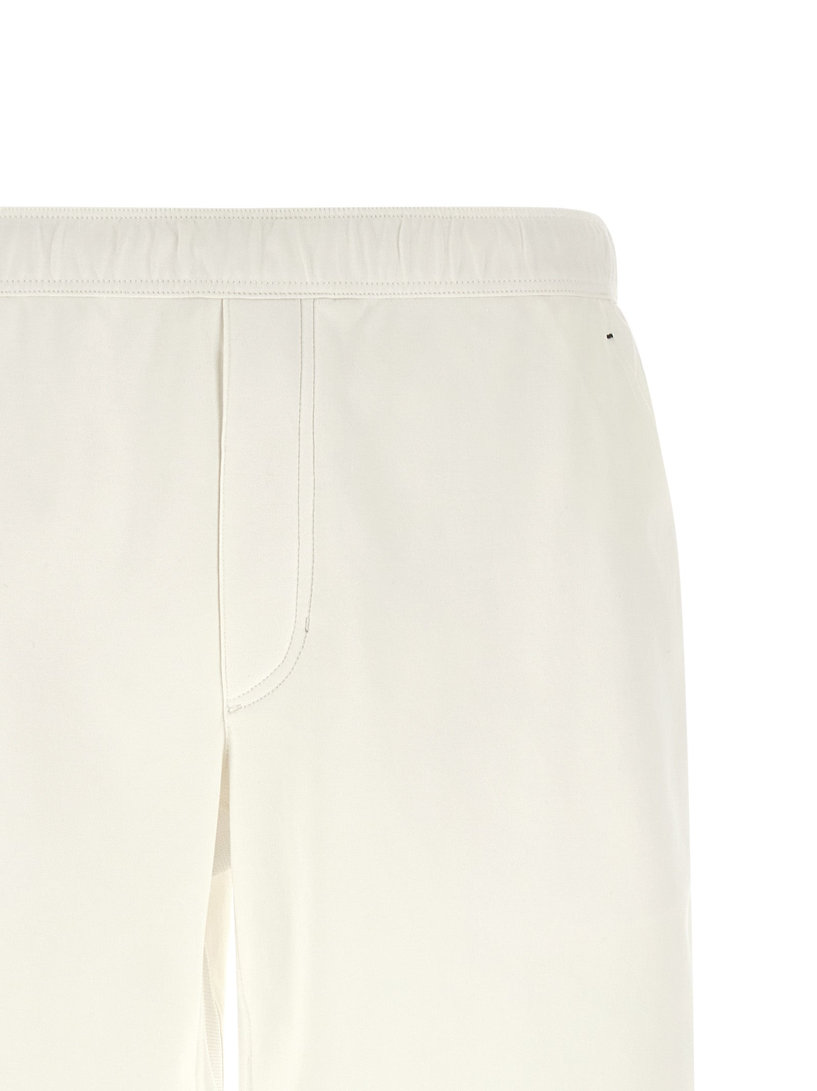 Experience unparalleled sophistication with Brunello Cucinelli's White Cotton Bermuda Shorts, a luxurious blend of comfort and elegance for the discerning individual.