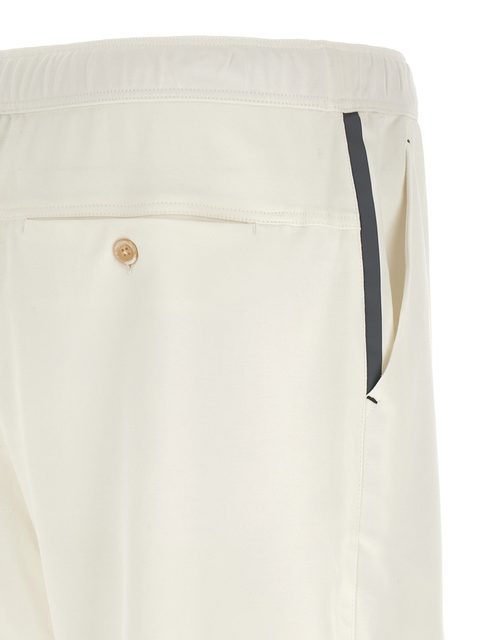 Elevate your summer wardrobe with Brunello Cucinelli's White Cotton Bermuda Shorts, a masterpiece of Italian craftsmanship and timeless elegance, perfect for any occasion.