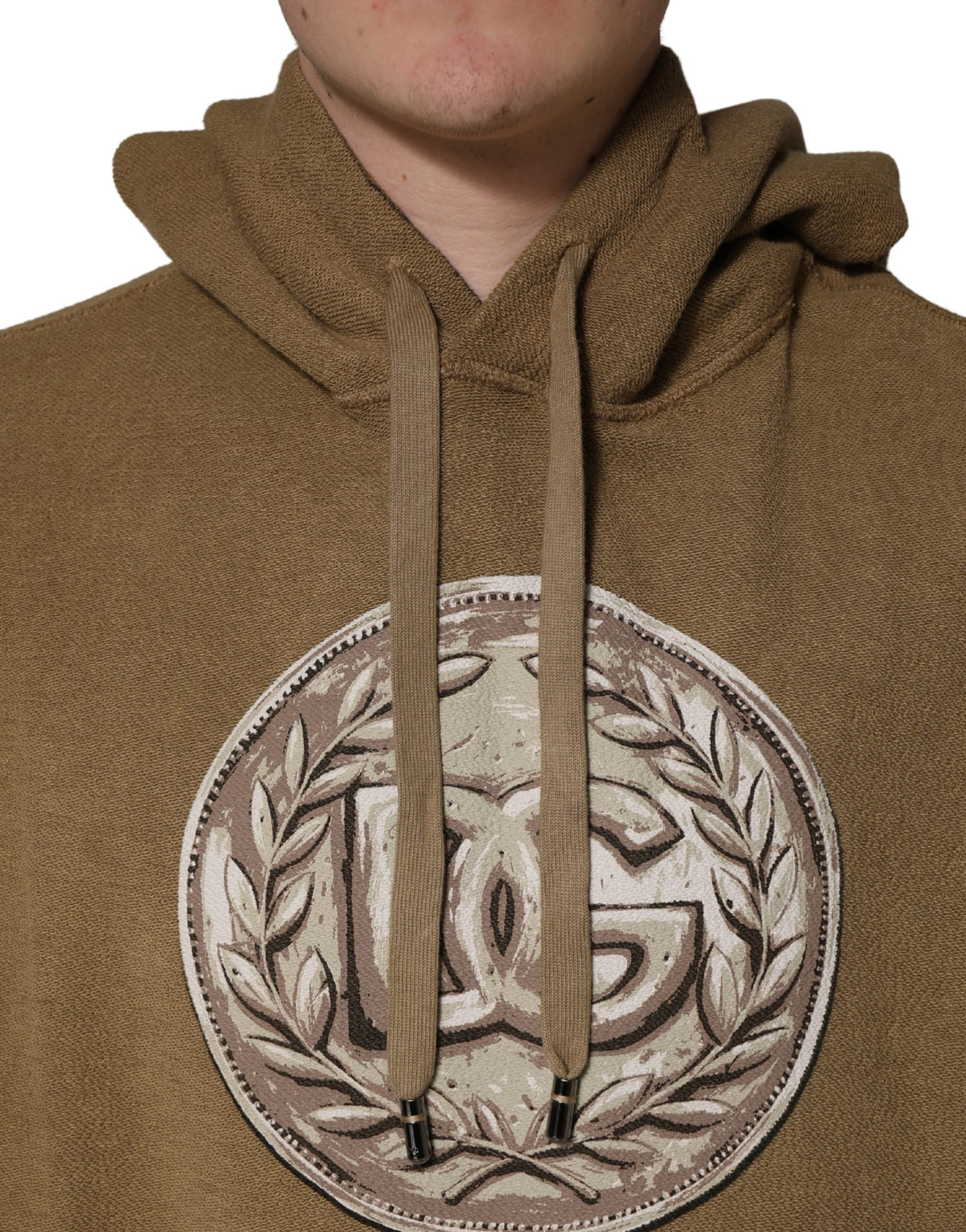 Elevate your wardrobe with the Dolce & Gabbana Brown Cotton Logo Coin Hooded Pullover, a masterpiece of Italian craftsmanship that embodies timeless luxury and effortless style.