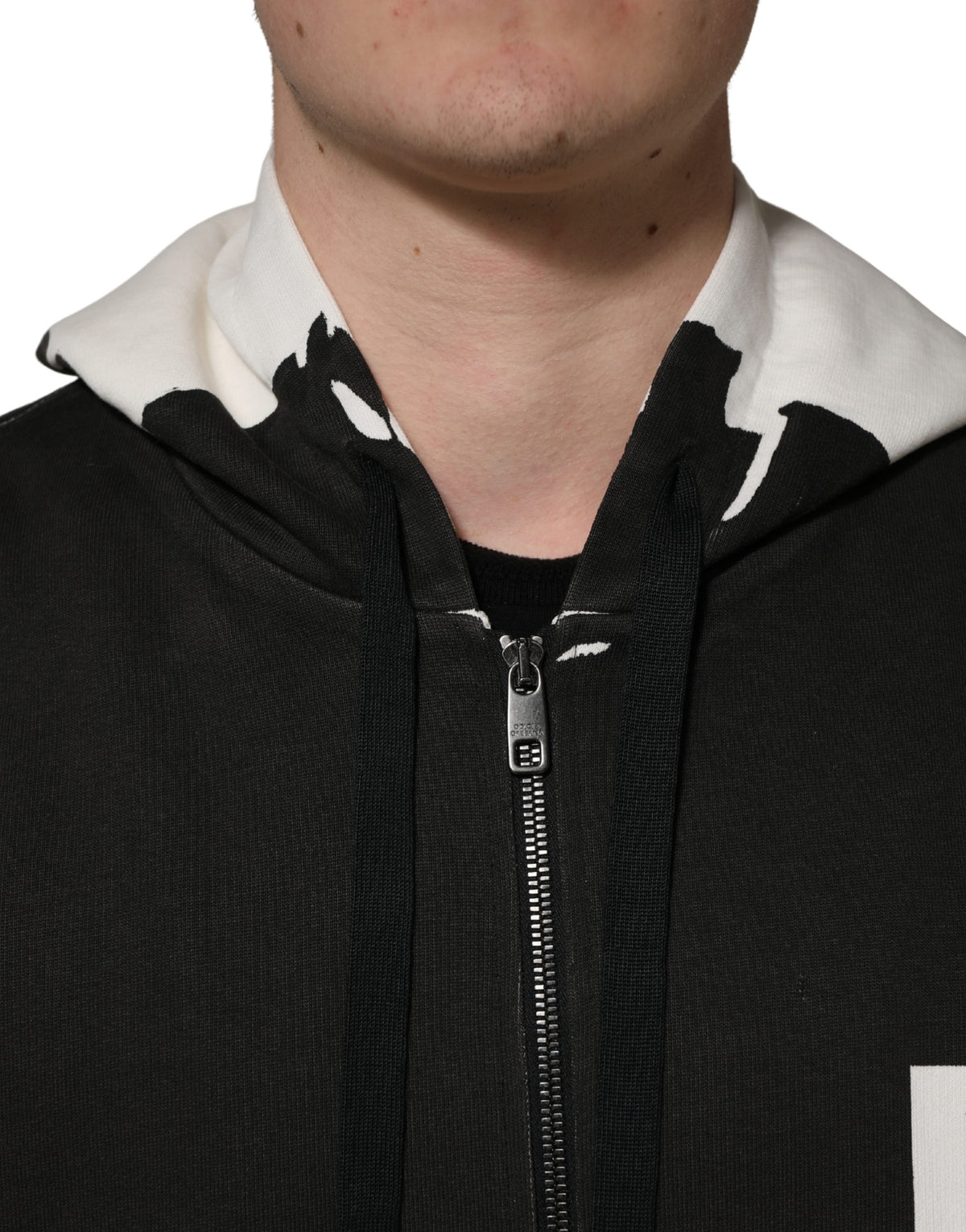 Indulge in the exquisite Dolce & Gabbana Black Cotton Logo Hooded Full Zip Sweater, where Italian craftsmanship meets bold design, elevating your luxury wardrobe with sophistication.