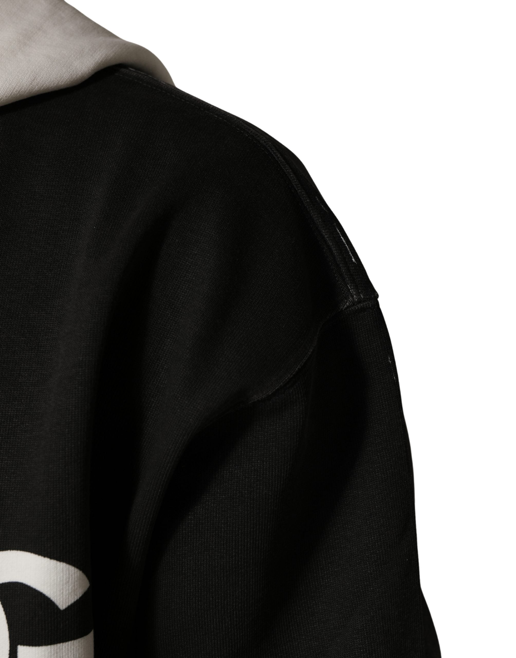 Indulge in the Dolce & Gabbana Black Cotton Logo Hooded Full Zip Sweater, where exquisite Italian craftsmanship meets bold elegance, perfect for the discerning style aficionado.