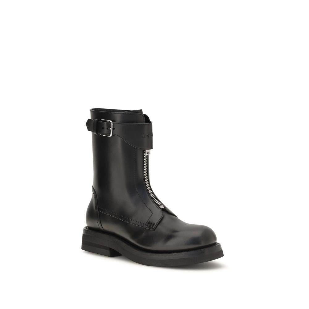 Step into unparalleled luxury with Alexander McQueen's Black Calf Leather Bos Taurus Lace-Up Boots, where exquisite craftsmanship meets contemporary elegance for the discerning individual.