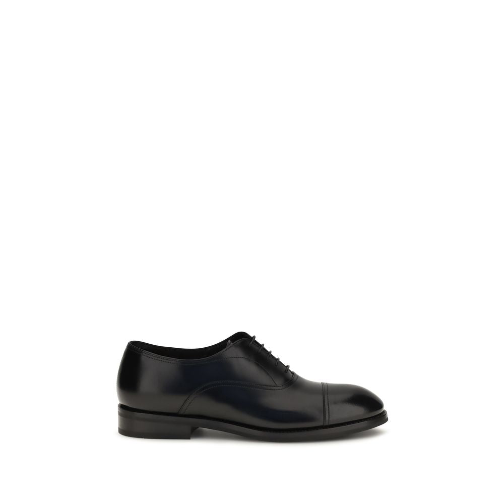 Experience timeless elegance with Santoni Black Calf Leather Bos Taurus Oxfords, crafted from luxurious calfskin for the discerning individual who values sophistication.
