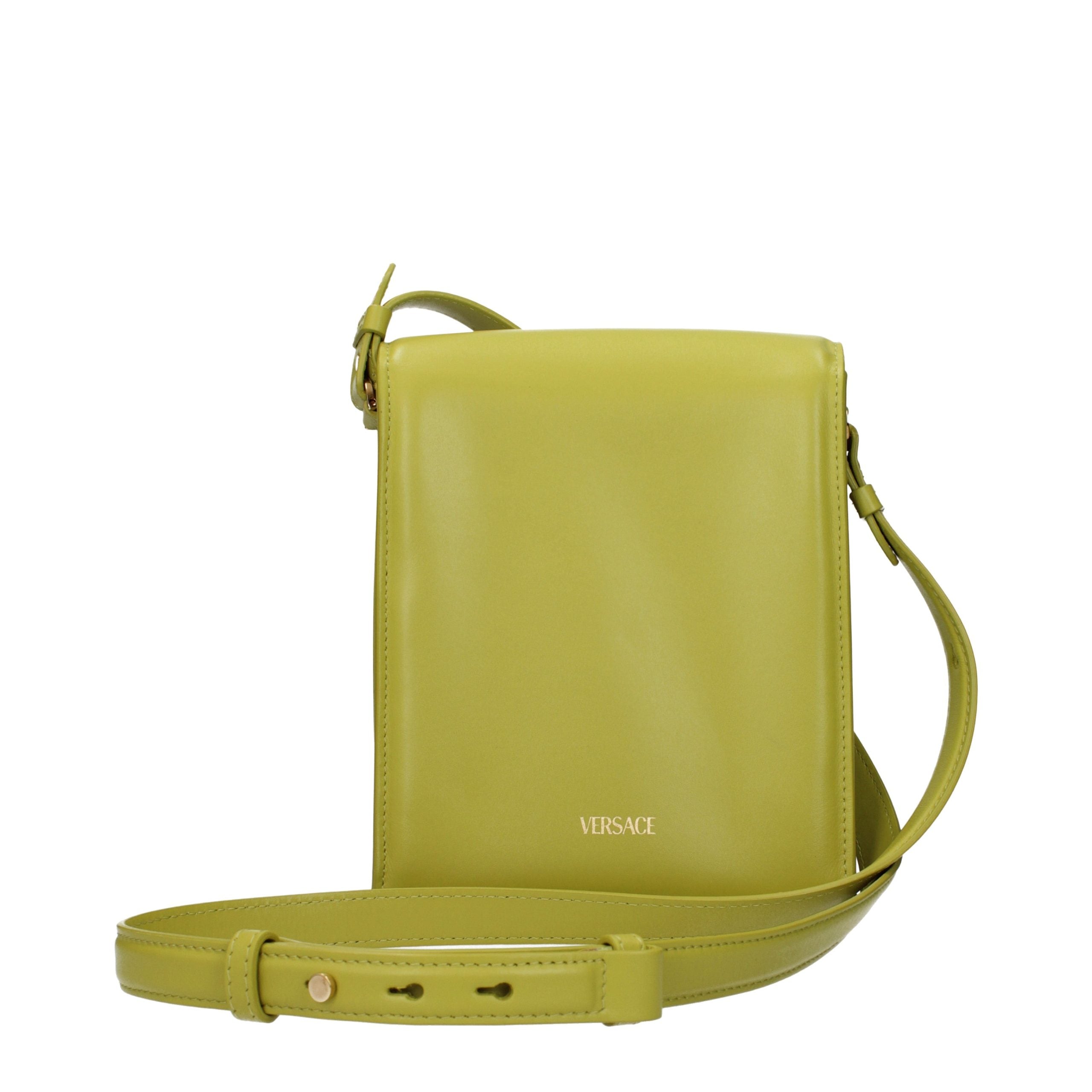 Discover the Versace Green Leather Crossbody Bag, a masterpiece of exquisite craftsmanship and luxurious design, perfect for the discerning individual seeking elegance.