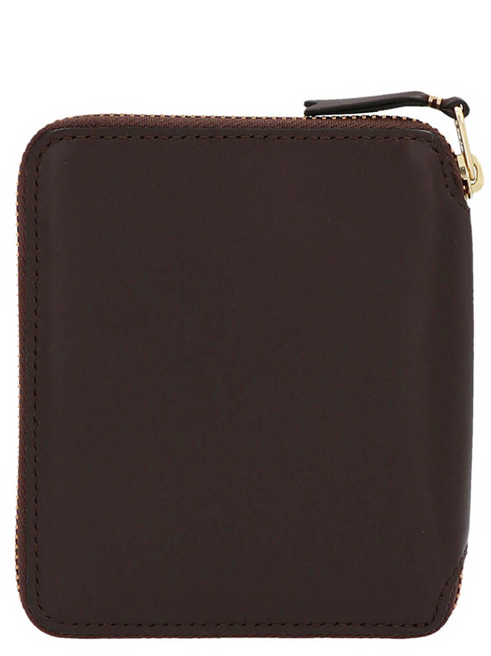 Discover the Comme Des Garçons Brown Cowhide Wallet, a masterpiece of artisanal luxury crafted from premium cow leather, embodying timeless elegance and sophistication.