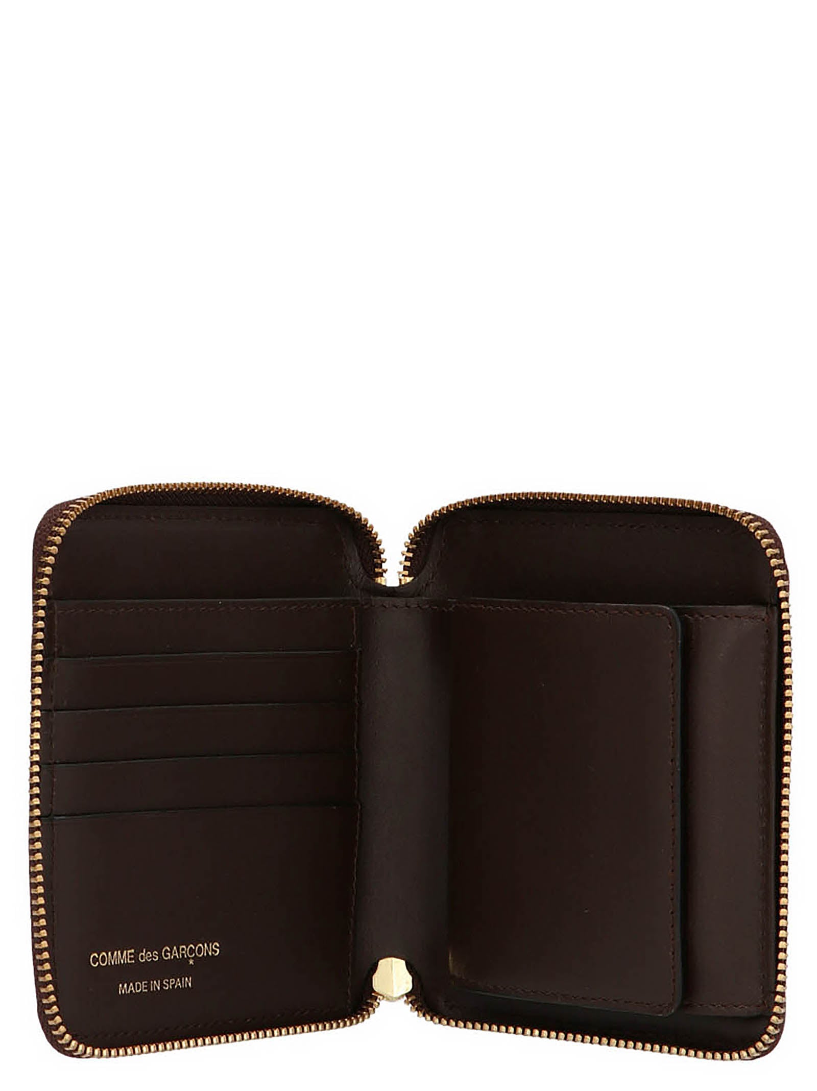Discover the COMME DES GARÇONS Brown Cowhide Wallet, a masterpiece of artisanal luxury crafted from exquisite cow leather, perfect for the discerning individual.