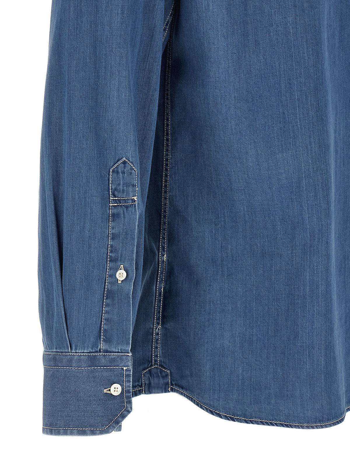 Indulge in the Brunello Cucinelli Blue Cotton Blouse, a masterpiece of Italian craftsmanship, where luxurious cotton meets timeless elegance for the discerning individual.
