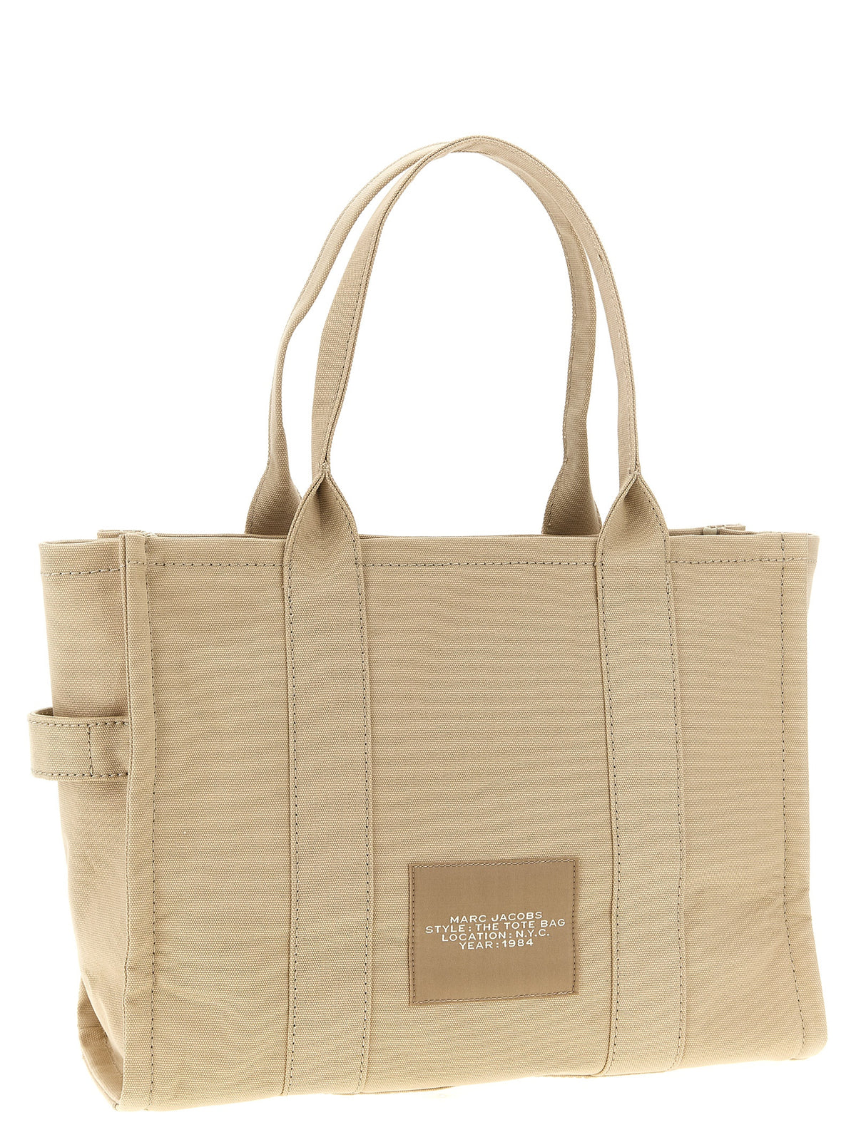Discover the Marc Jacobs Beige Cotton Tote Bag from The Canvas Large Tote collection, a luxurious blend of artisanal craftsmanship and timeless elegance, perfect for any occasion.