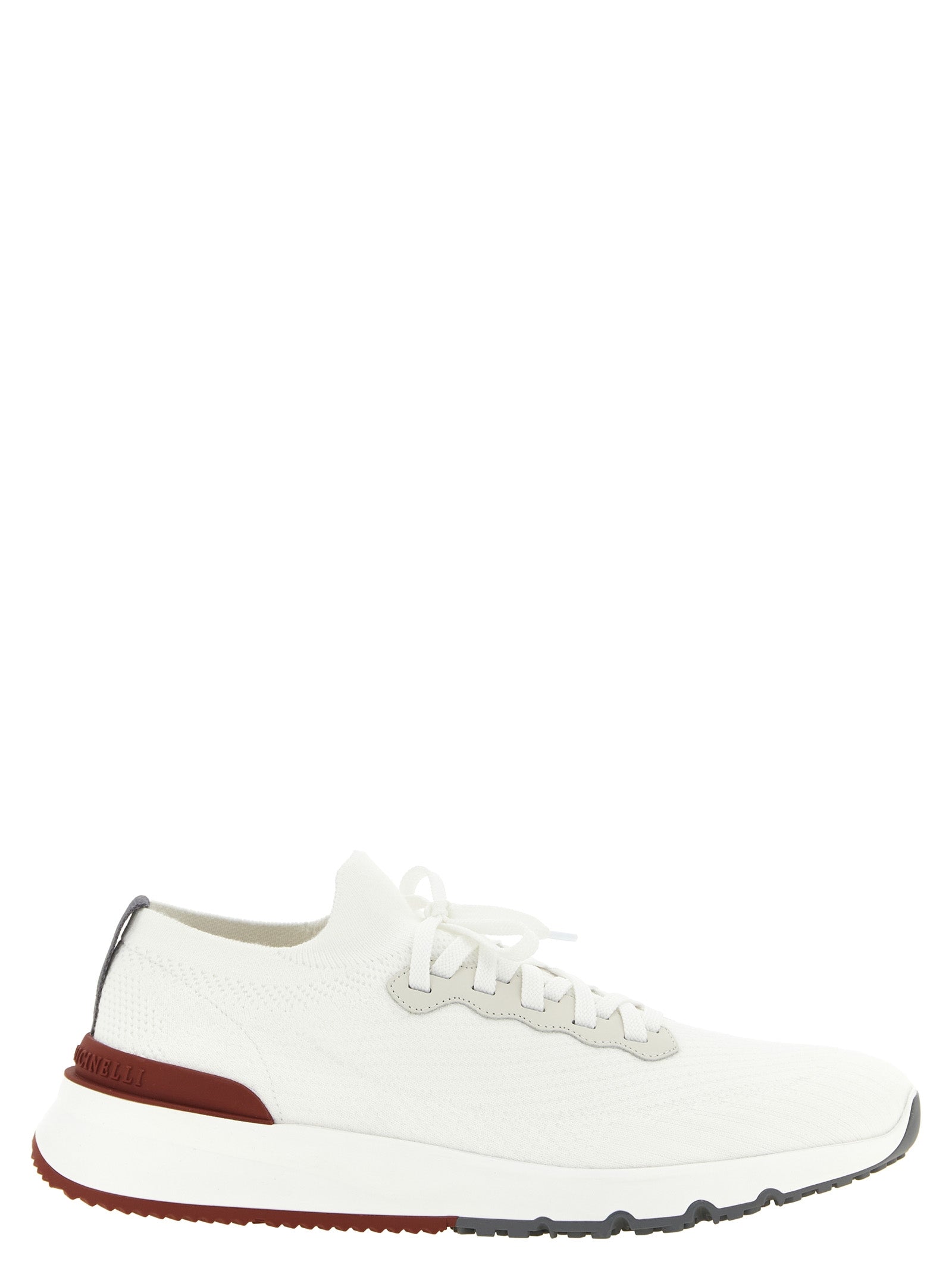 Elevate your style with Brunello Cucinelli White Polyethylene Athletic Sneakers, where artisanal luxury meets modern sophistication in a seamless blend of comfort and elegance.