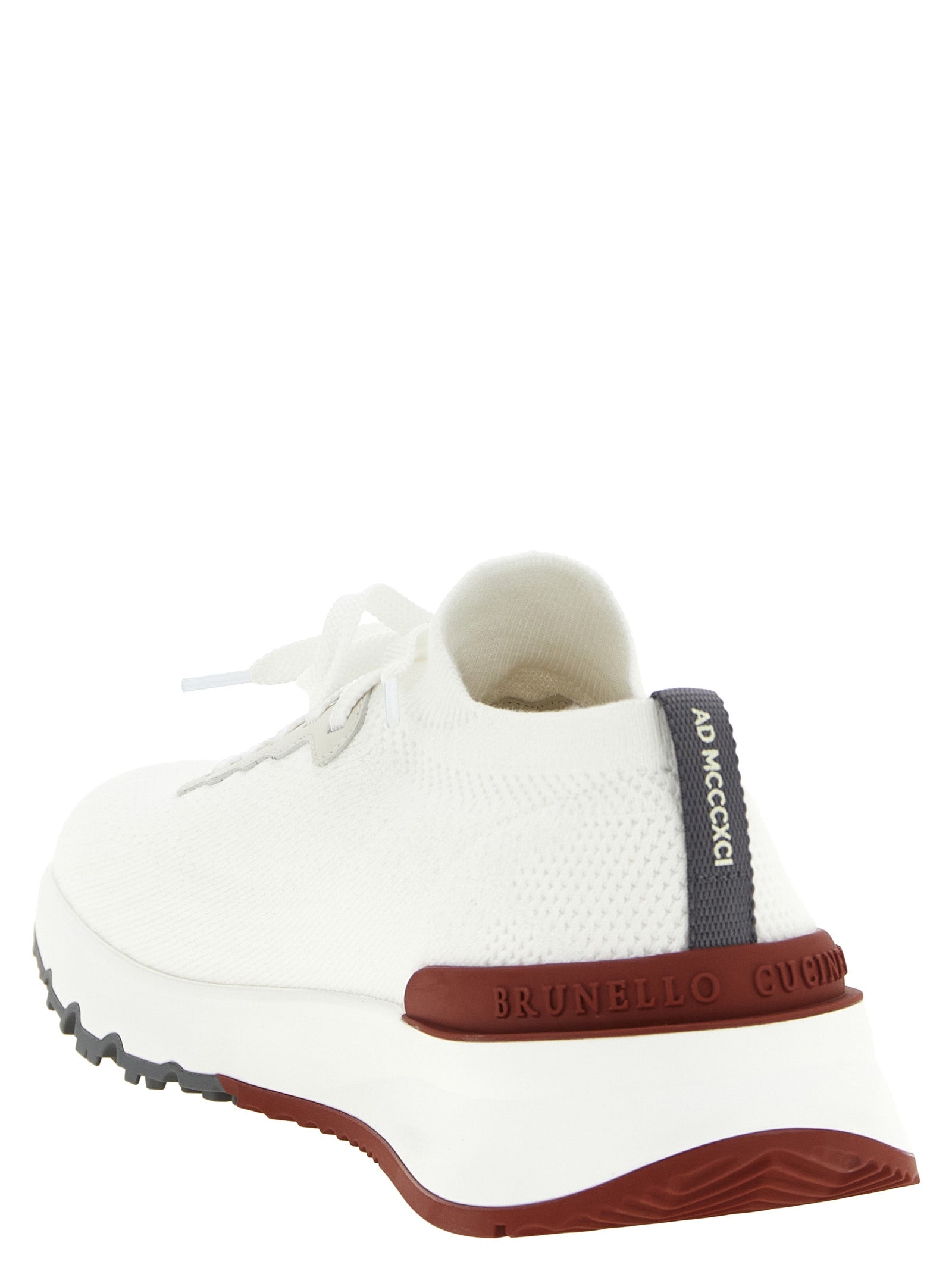 Experience the pinnacle of luxury with Brunello Cucinelli's White Polyethylene Athletic Sneakers, crafted in Italy for those who embrace elegance and sophistication in every step.
