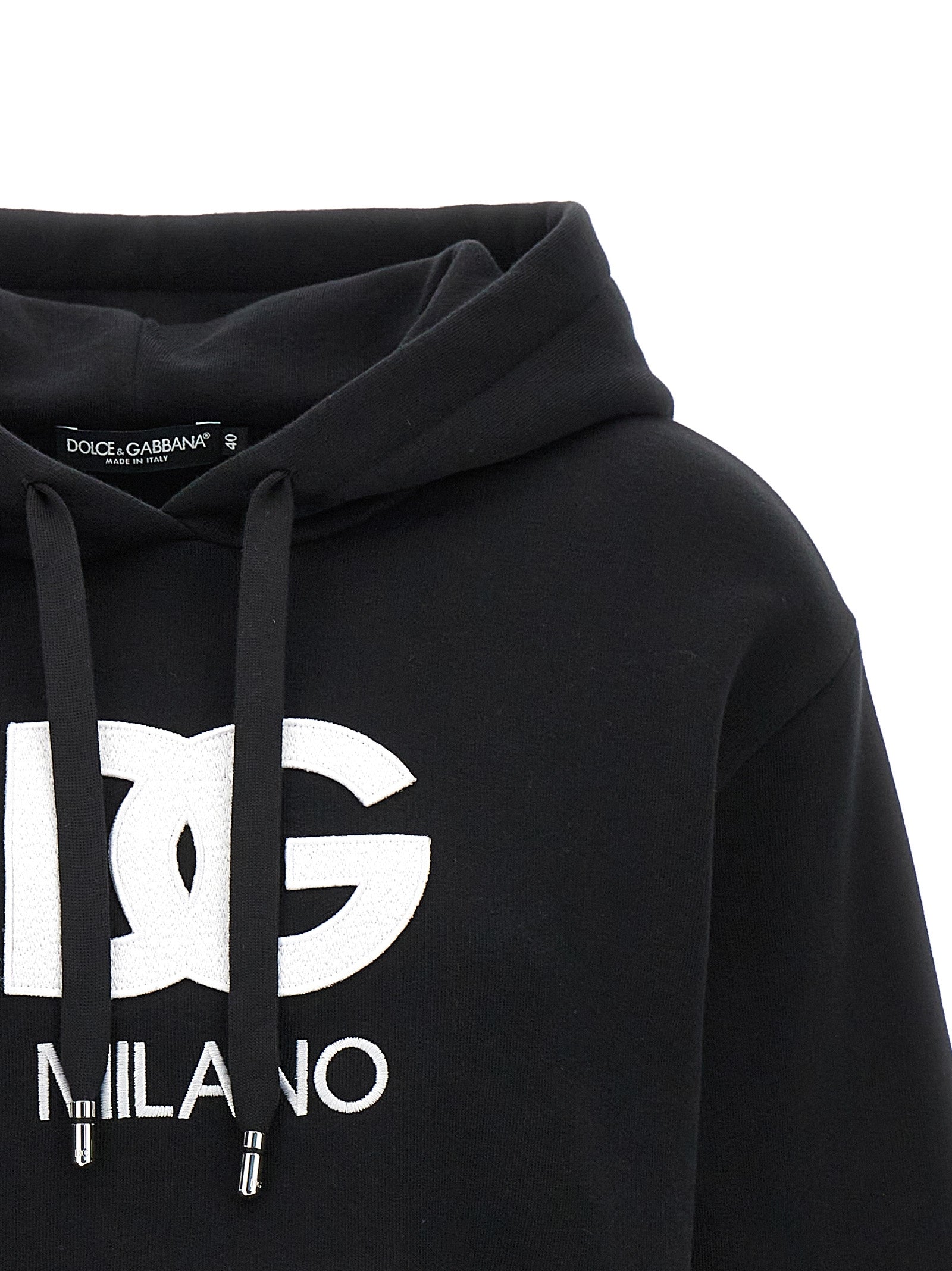 Elevate your wardrobe with the Dolce & Gabbana Black Cotton Hoodie, a luxurious blend of comfort and sophistication, embodying Italian craftsmanship for the discerning individual.