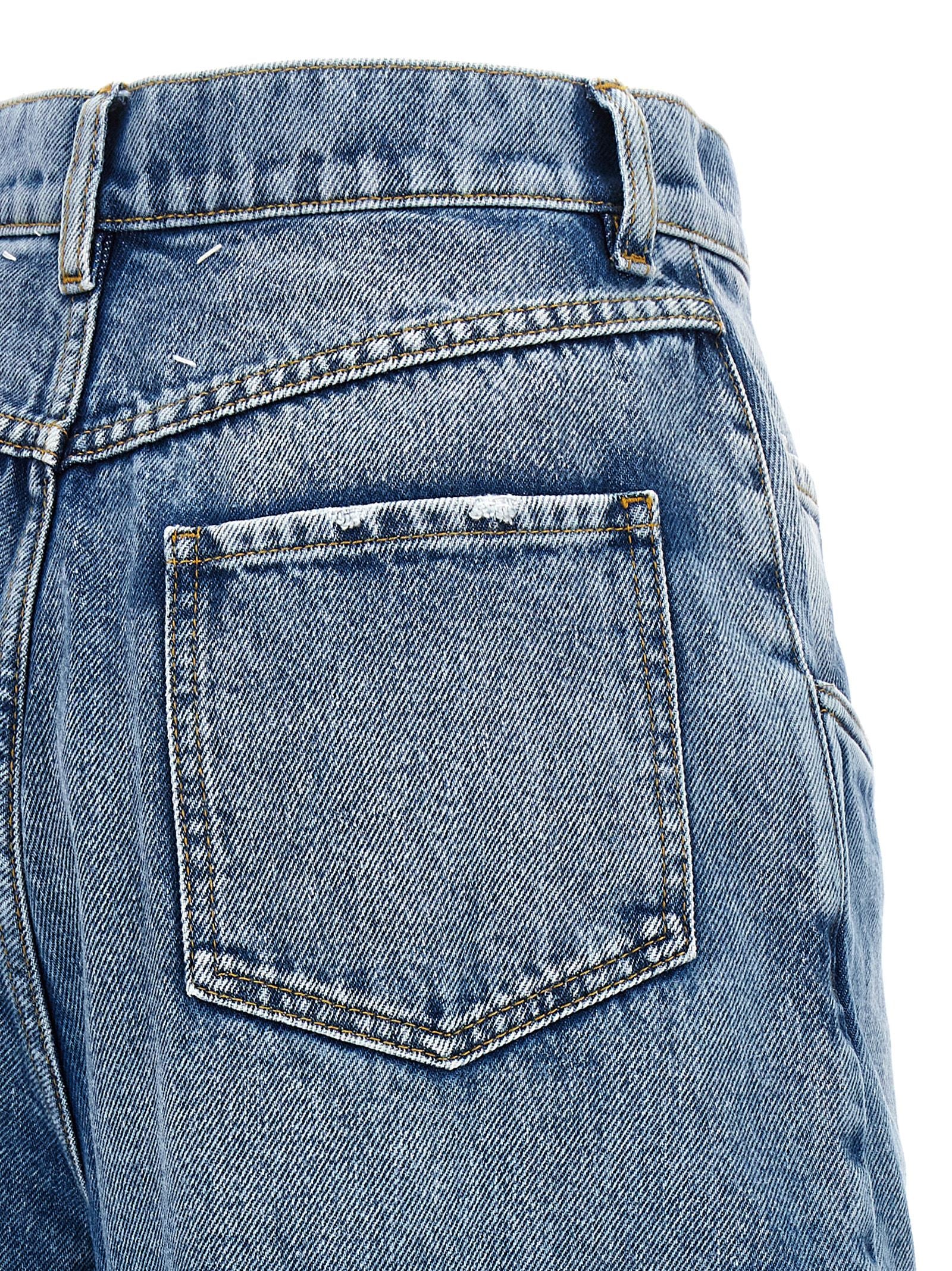 Discover the Maison Margiela Blue Cotton Straight-Leg Jeans, a fusion of artisanal craftsmanship and modern elegance, perfect for those who appreciate true luxury.